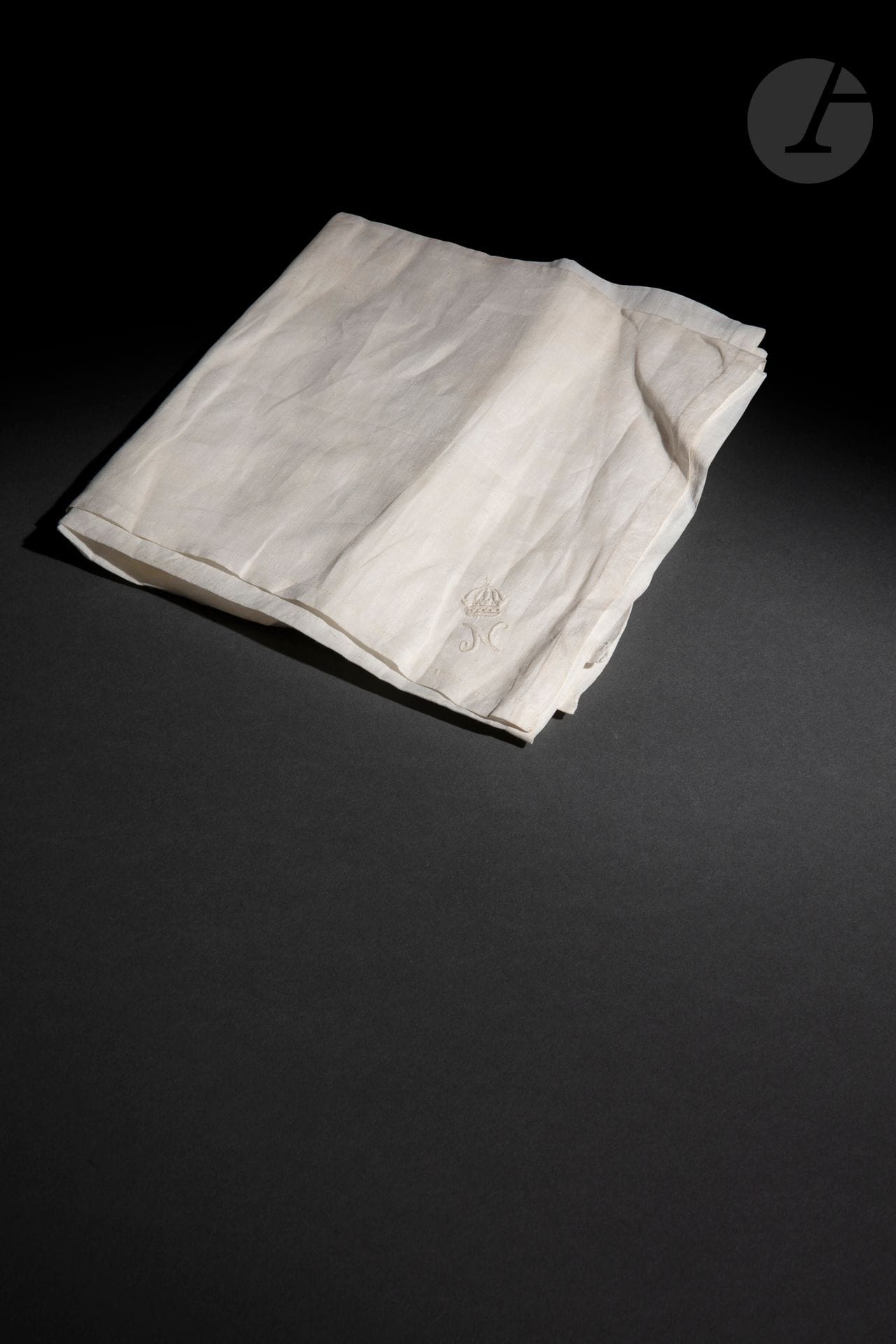 Emperor Napoleon I's handkerchief.
In white batiste, hemmed and embroidered with the numeral "N" in one corner.
70 x 70 cm
First Empire period.
B.E. (Small rust stains).

Provenance: 
Glain Collection 1st sale, Angers (Maître Martin), November 23, 1980, lot 392. 
It is noted that this handkerchief from St. Helena is said to have come from Bertrand's souvenirs given to Count Doumerc (1765-1847), colonel of cuirassiers and then division general in 1810.