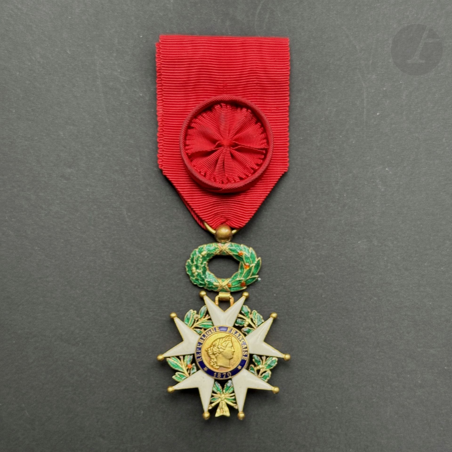 FRANCE 
ORDER OF THE LEGION OF HONOR 
Officer's star, IIIrd Republic period. 
Gold and enamel. Eagle head hallmark. Rosette ribbon. 
60 x 39 mm - Gross weight: 20.4 g
T.T.B.