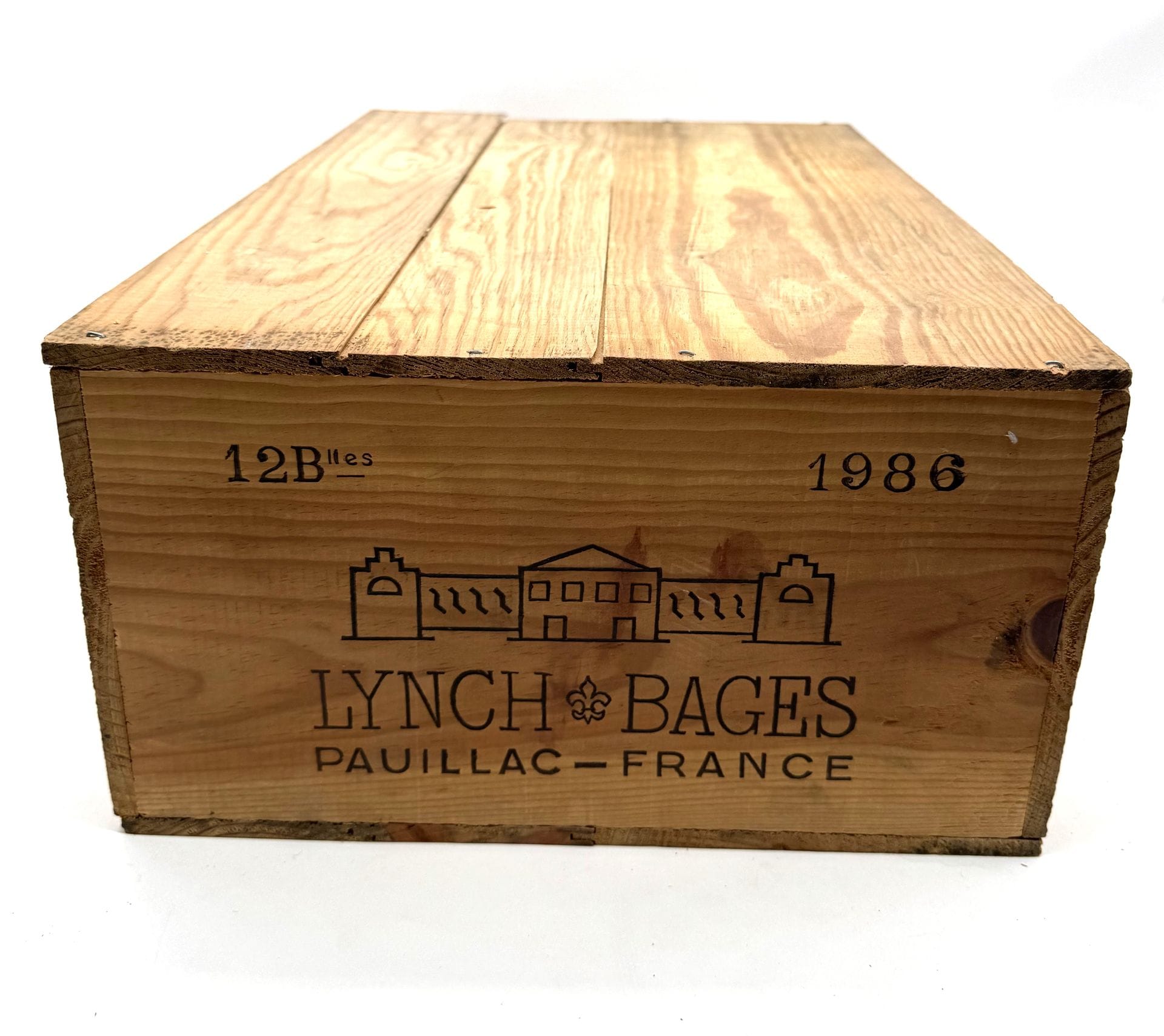 12 B CHÂTEAU LYNCH BAGES (original wooden case) (1 B.G; 4 T.L.B.+; 5 T.L.B; 2 H.E.-; some capsule marks), GCC5 Pauillac, 1986