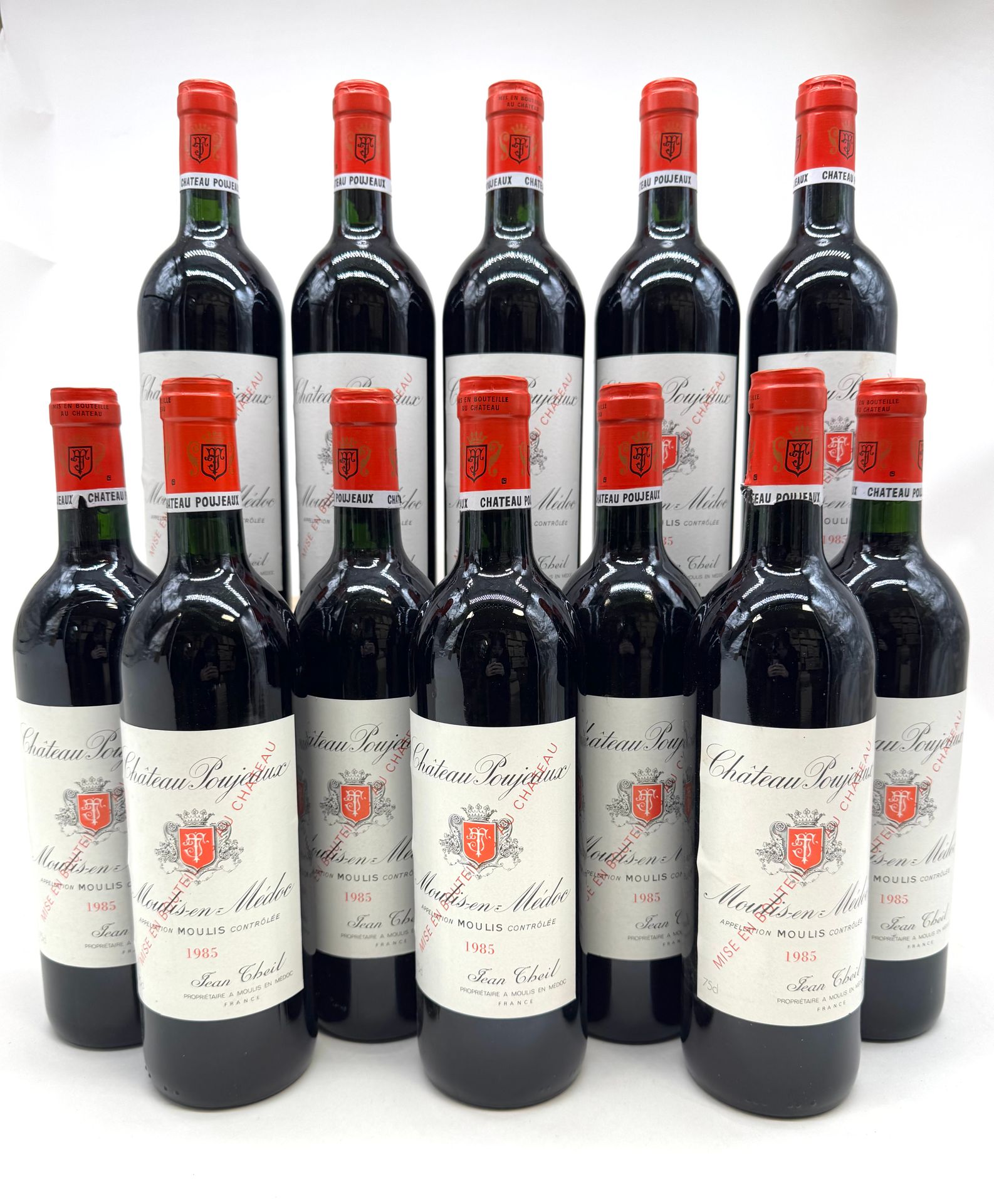 12 B CHÂTEAU POUJEAUX (Caisse Bois d'origine) (1 c.a. bas de jupe), Moulis, 1985