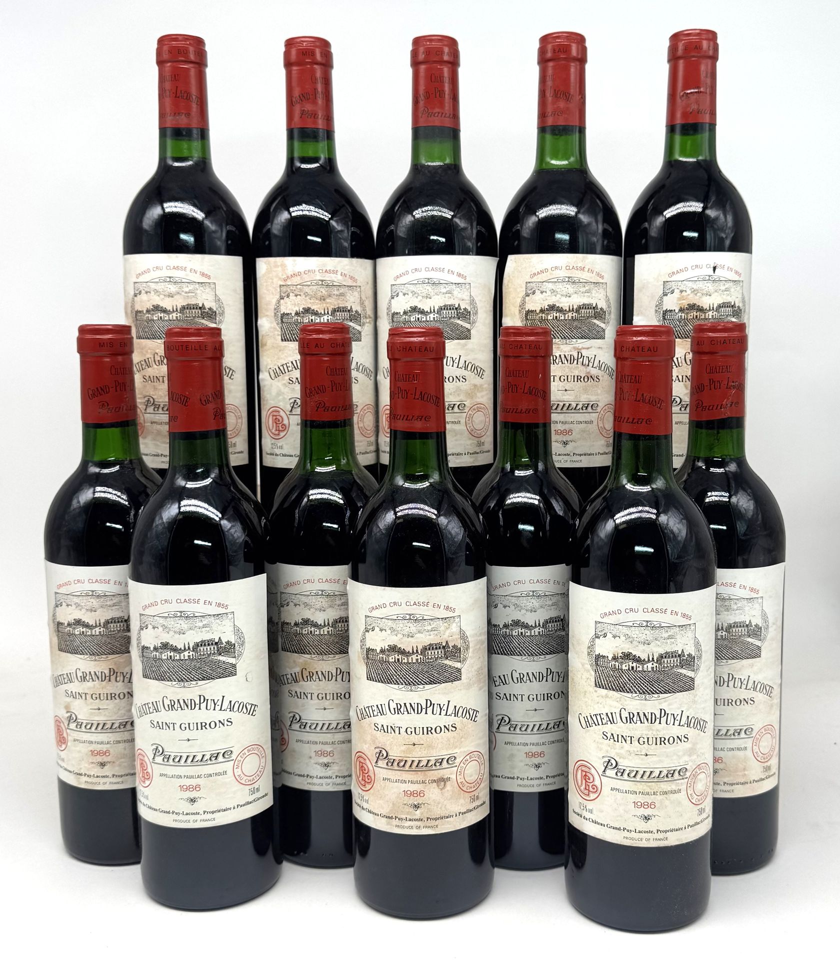 12 B CHÂTEAU GRAND PUY LACOSTE (Caisse Bois d'origine) (4 T.L.B.+; 4 T.L.B. et 1 H.E.+; e.t.h; 1 c.a. côté), GCC5 Pauillac, 1986