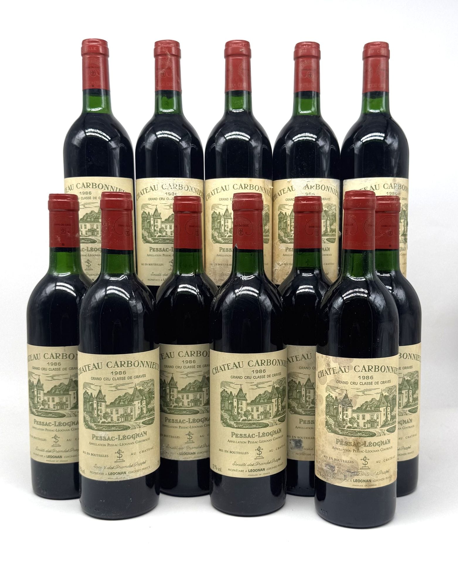12 B CHÂTEAU CARBONNIEUX Rouge (Caisse Bois d'origine) (2 B.G; 8 T.L.B.+ et 1 T.L.B; e.t.h. à e.t.a.), CC Graves, 1986