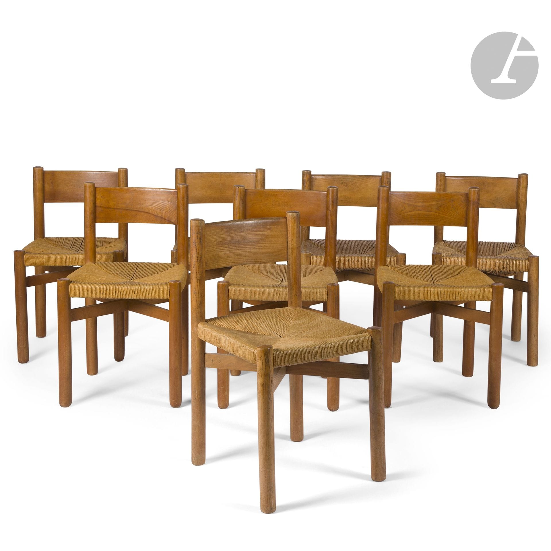 CHARLOTTE PERRIAND (1903-1999) - SUCCESSION X., MANTES-LA-VILLE
Modèle dit communément Méribel conçu vers [1941], série acquise à la Galerie Steph Simon vers 1960
Suite de 8 chaises. 
Les pieds cylindriques en frêne et réunis sous les assises par des entretoises cruciformes. 
Les bandeaux cintrés de dossier en frêne massif ; les tranches supérieures profilées. 
Les assises paillées. 
État d’usage, six paillages refaits. 
Hauteur : 76 cm – Longueur : 42 cm – Profondeur : 42 cm

Provenance :
Succession X., Mantes-la-Ville. Œuvre acquise auprès de la Galerie Steph Simon vers 1960. Cette suite de chaises faisait partie d’un aménagement complet conçu par le décorateurColas Guérin pour M. et Mme X., comprenant un ensemble mobilier de Charlotte Perriand (banquette Tokyo, deux tabourets Berger, table à gorges et notre suite de chaises) complété d’une applique de Serge Mouille et d’un meuble d’André Chetaille et présentés sous les numéros précédents et suivants de cette vacation.

Bibliographie :
- Art & Décoration – N° 9 de 1948. Modèle identique reproduit page 9.
- Aujourd’hui Art et Architecture – N° 7 de mars 1956. Modèle identique reproduit page 70.
- Jacques Barsac – Charlotte Perriand – L’œuvre complète, volume 2, 1940-1955 – Éditions Archives Charlotte Perriand/Norma, Paris, 2015. L’original du plan et de l’élévation de notre modèle de siège reproduit page 102, des modèles identiques reproduits page 161.
- Jacques Barsac – Charlotte Perriand – L’œuvre complète, volume 3, 1956-1968 – Éditions Archives Charlotte Perriand/Norma, Paris, 2015. Modèles identiques reproduits pages 268, 333 et 336.
- Patrick Favardin – Le Style 50 – Un moment de l’art français – Éditions Sous le Vent-Vilo, Paris, 1987. Modèle identique reproduit page 23.