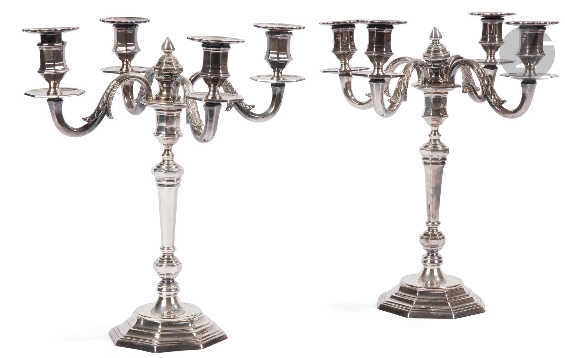 Pair of silver-plated candelabra with four foliate arms, the shaft is panelled and the base octagonal.
Neoclassical style.
Height: 33 cm