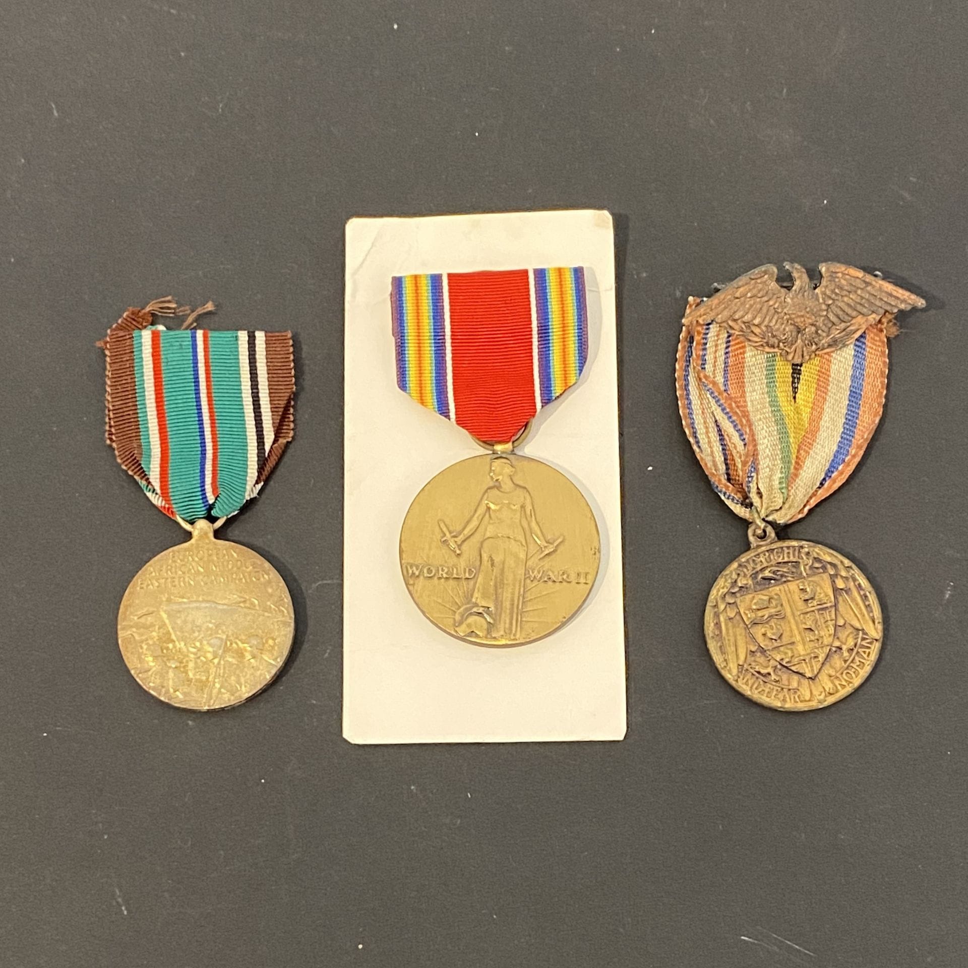U.S.A. 
Three medals: 
Bronze "DO right and fear no man" medal, WW2 Victory medal and Eastern campaign (1941-1945) commemorative medal. 
Ribbons. 
T.T.B.