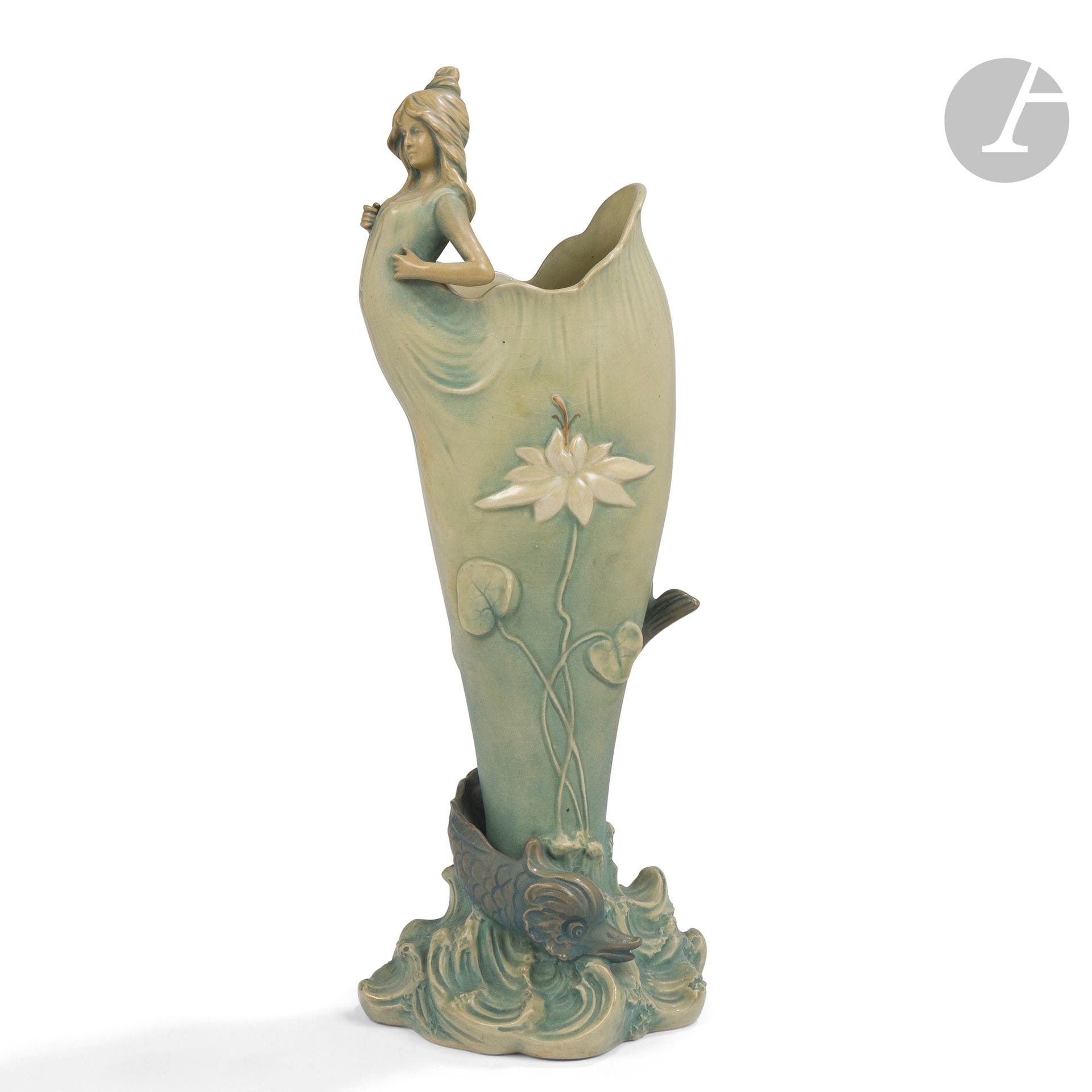 MANUFACTURE BERNARD BLOCH (1836-1909) AUSTRIA
Young woman emerging from an animated aquatic environment
High decorative vase; the title motif in the round and in relief. Polychrome enameled ceramic proof. Art Nouveau period. Marked BB under the base. H. 41.5 cm