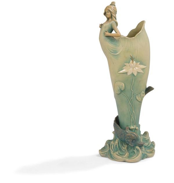 MANUFACTURE BERNARD BLOCH (1836-1909) AUSTRIA Young woman emerging from an animated aquatic environment High decorative vase; the title motif in the round and in relief. Polychrome enameled ceramic proof. Art Nouveau period. Marked BB under the base. H. 41.5 cm