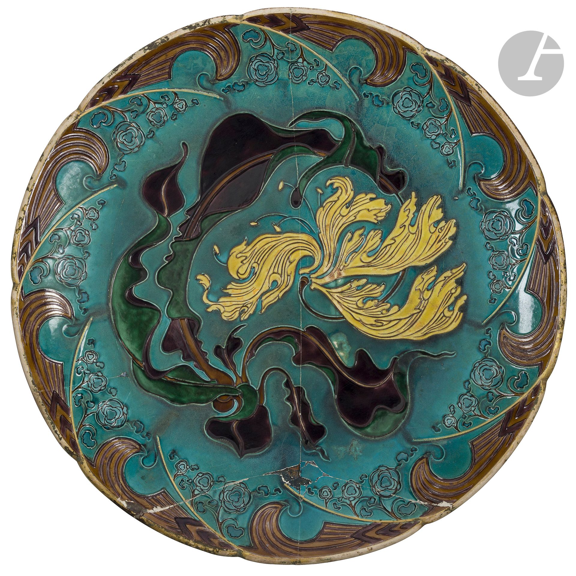 FÉLIX BRACQUEMOND (1833-1914)
Waves and flowers with cut-out petals - In the Japonism style, circa 1879
Very important dish. Proof in polychrome enameled ceramic, decorated with raised rings. Executed in the Haviland &amp; Cie workshop in rue Blomet, Paris XV.  Major accidents and old restorations (staples). Marked 36 on the back. D.55,5cm

Public collections and related works:
- Petit Palais - Musée des Beaux-arts de la Ville de Paris - A dish very close to our work is preserved in the collections of this institution under inventory number OGAL179.
- Philadelphia Museum of Art, Philadelphia, Pennsylvania (USA) - A dish very close to our work is conserved in the collections of this institution under inventory number 2018-6-2.
- Musée national Adrien Dubouché, Limoges - A dish very close to our work is kept in the collections of this institution under inventory number ADL9234.

Bibliography and related works:
Jean-Paul Bouillon - Félix Bracquemond et les arts décoratifs, du japonisme à l'Art nouveau - Catalogue de l'exposition itinérante organisée au musée national Adrien Dubouché, Limoges (5 avril - 4 juillet 2005); au Deutsches Porzellanmuseum, Selb-Plöβberg (25 juillet - 25 octobre 2005); au musée départemental de l'Oise, Beauvais (15 novembre 2005 - 14 février 2006), Éditions de la Réunion des musées nationaux, Paris, 2005. Our work to be compared with the plate referenced under number 65 in the catalog, reproduced on page 156, and the preparatory drawings referenced under numbers 78 and 80, reproduced on pages 165 and 167 respectively, as well as on the cover.