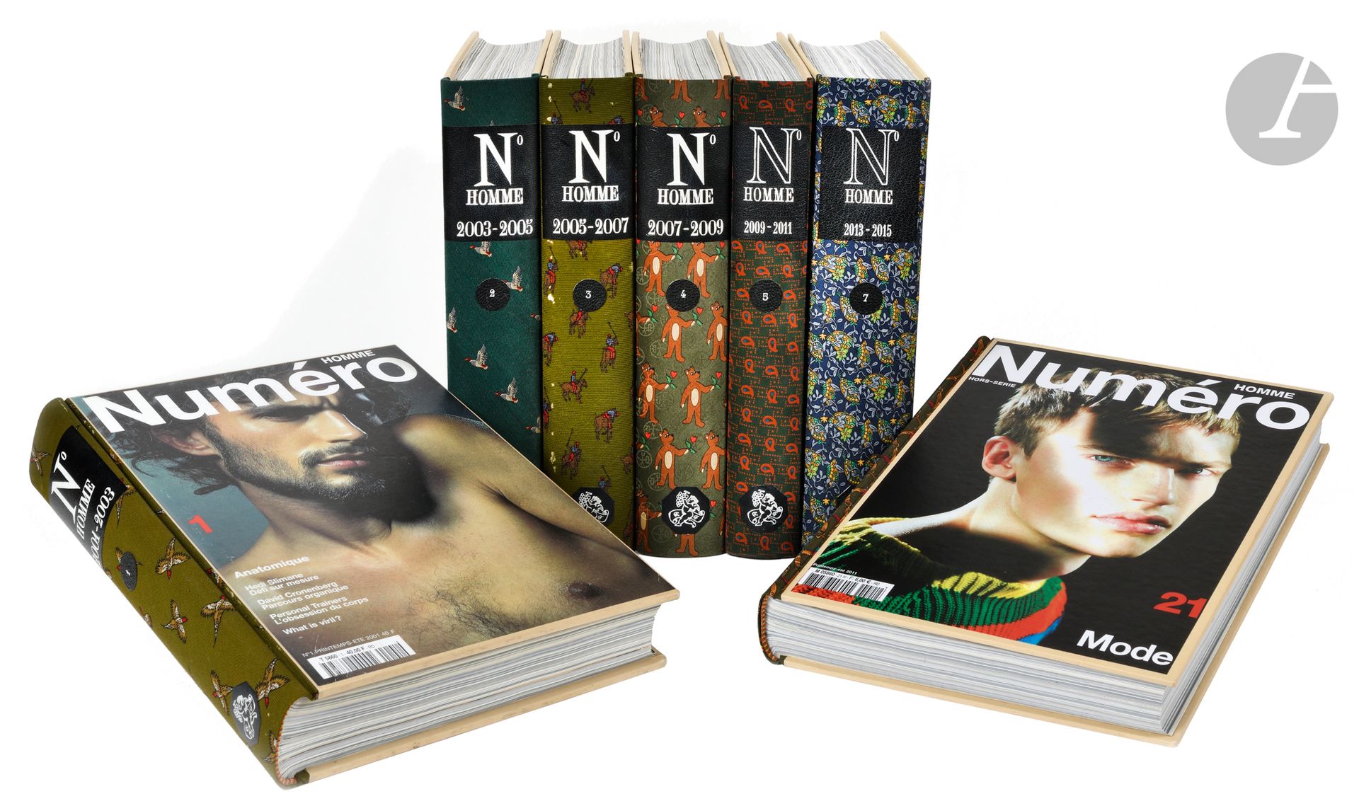 [MEN'S MAGAZINE].
Numéro Homme.
Paris: Ayache puis Mazarine, 2001-2020. - 41 issues in-4, 294 x 229 of which 37 bound in 9 volumes, and 4 stapled. Bound in Bradel style, boards with covers, spines covered with fancy cloth, from ties, each volume being different, black leather title-pieces, tombstone and bookplate, titling in white with minor differences due to change of binder (Ateliers Laurenchet, then Boichot).

41 Numéro homme magazines, including 37 bound from issue no. 1 (2001) to issue no. 36 (2019) plus a special Fashion issue (Spring-Summer 2013), and 4 paperback magazines from issue no. 37 to issue no. 40 (Autumn-Winter 2020-2021).

Former fashion director of Jill magazine, Babeth Djian, "tired of reading magazines that told her how to seduce a man", wanted "to create a magazine for an intelligent, chic woman who was interested in art, design, music, not the latest anti-wrinkle product" and founded the monthly fashion magazine Numéro magazine in 1999. The biannual men's magazine Numéro Homme was launched in 2001. Babeth Djian appointed Philip Utz editor-in-chief in 2013.

The seven volumes are bound with spines decorated with fancy fabrics from ties. Each volume has its own motif.

Minor wear to spine of volume 3.