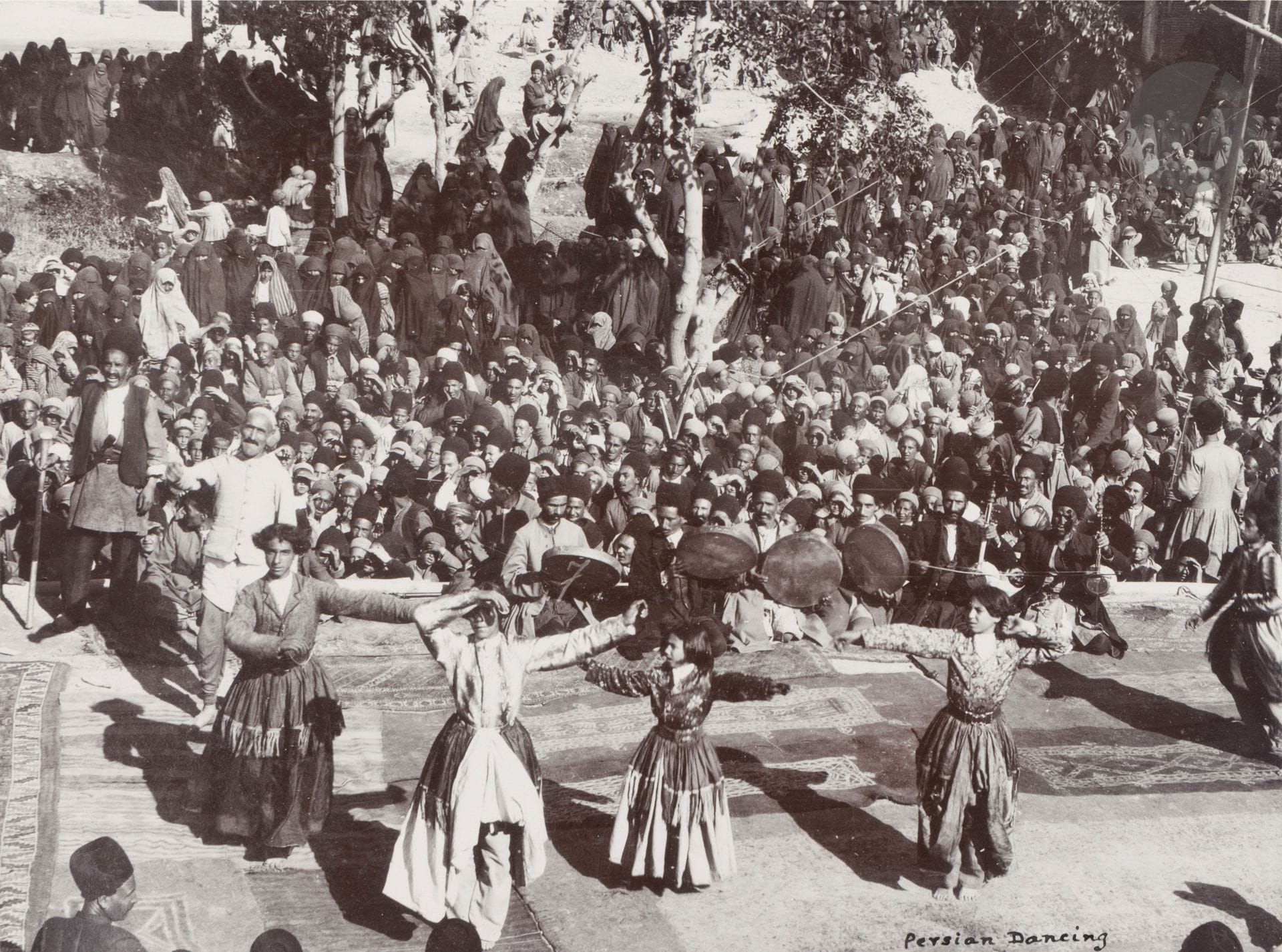 Unidentified amateur photographer 
Kurdistan, c. 1914-1920. 
Iran. Syria. Turkey. Armenia. Iraq. Azerbaijan. 
Tabriz. Urmi. Religious and secular architecture. Kurds. Ruins. Executions. Mar Shimun. Refugees. Indian soldiers. Members of the frontier commission. Eclipse. Religious gatherings. Persian and Kurdish dancers. Hosap fort. Ceremony. School. Aqra. Baghdad. Kerbala. Nomads. Refugee camp. Babylon. Date harvest. 
Oblong in-4 album (spine detached), consisting of approximately 200 prints on silver and citrate paper, mounted on card. Numerous annotations and dates in ink on the prints. 
Format: from 16.5 x 22 to 5 x 7.5 cm