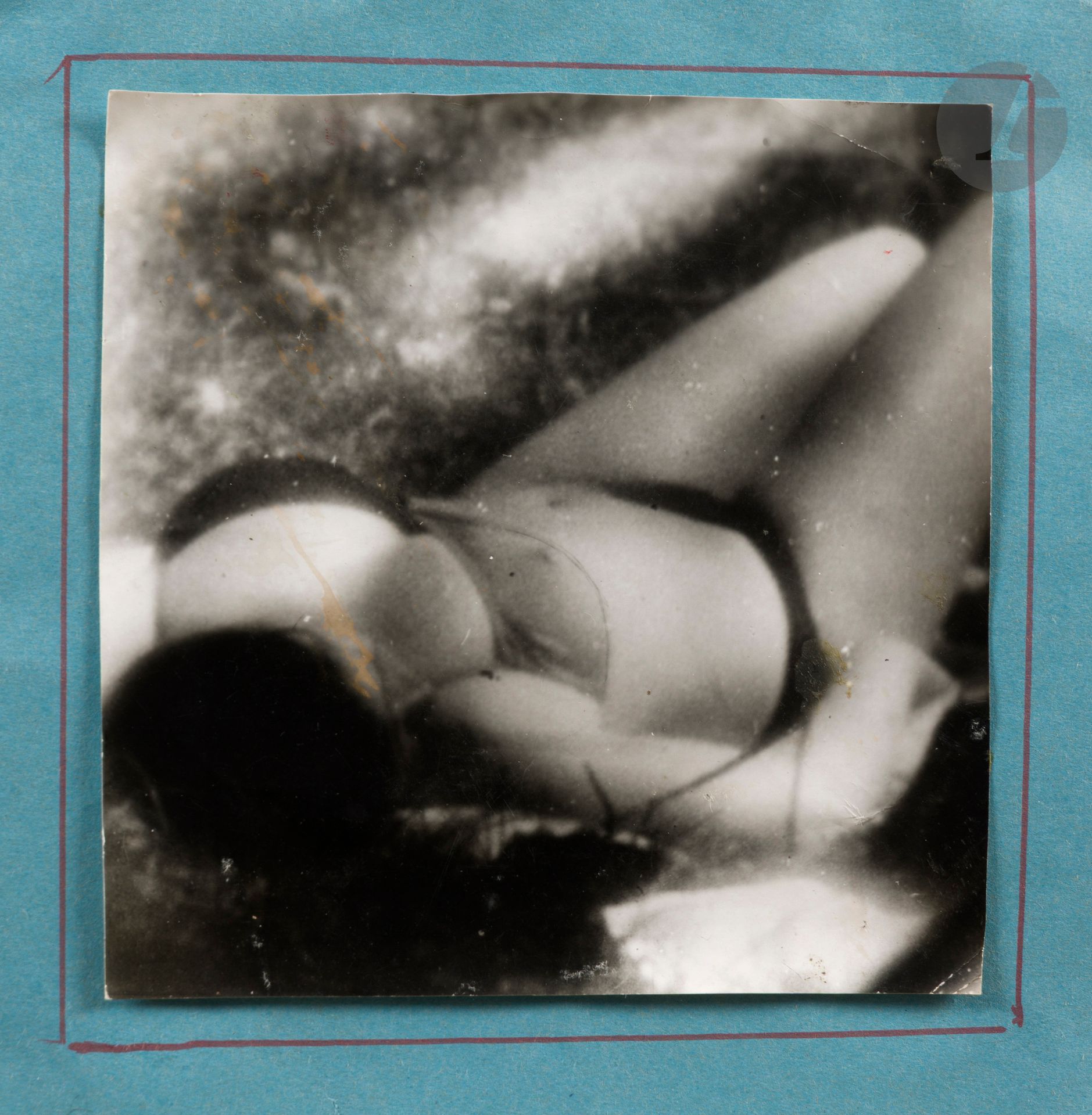 Miroslav Tichy (1926-2011)
Untitled [Reclining Woman in a Bathing Suit], c. 1960-1970. 
Vintage silver print, mounted on the photographer's card. Tichy Ocean Foundation label with inventory number "5-2-6" on verso of frame. A certificate of authenticity from the Tichy Ocean Foundation accompanies the work. 
Print: 14.5 x 14.5 cm - Mounting: 19.1 x 19.3 cm - frame 

Provenance : 
Private collection, Paris.