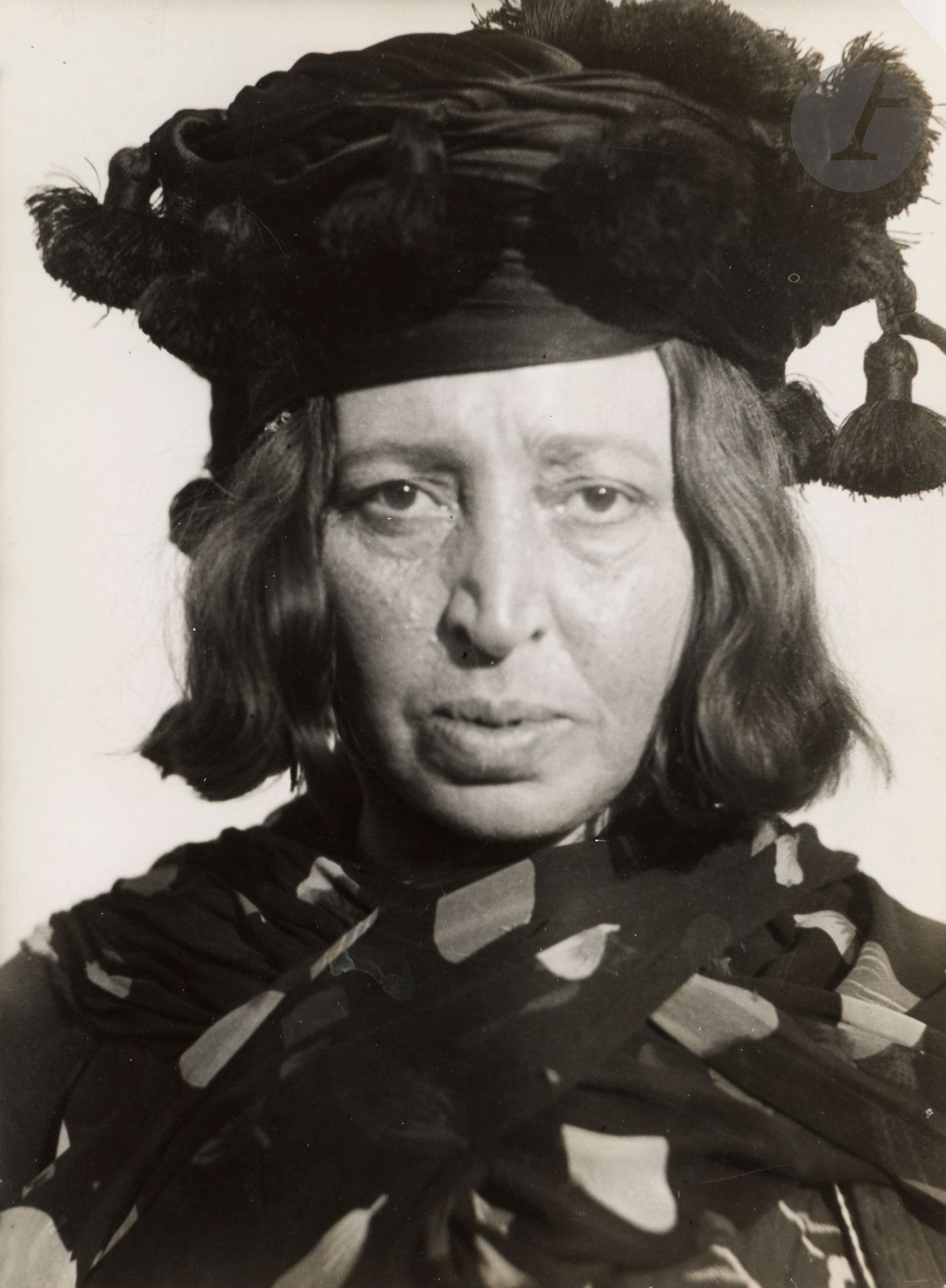 Lotte Errell (1903-1991) 
Kurdish women, c. 1934. 
Hafza Chan, Kurdish politician. Adela Chan, daughter of Osman Pasha. Traditional Kurdish headdresses, clothing and jewelry. 
Five (5) vintage silver prints and ten (10) vintage monoprints mounted on a mock-up for publication in Harper's Bazaar. Photographer's stamps and credit, agency stamps, captions and descriptions on versos. 
Sizes: 7 x 5.7 to 24 x 18 cm 

Provenance: 
Gene Fenn Collection.