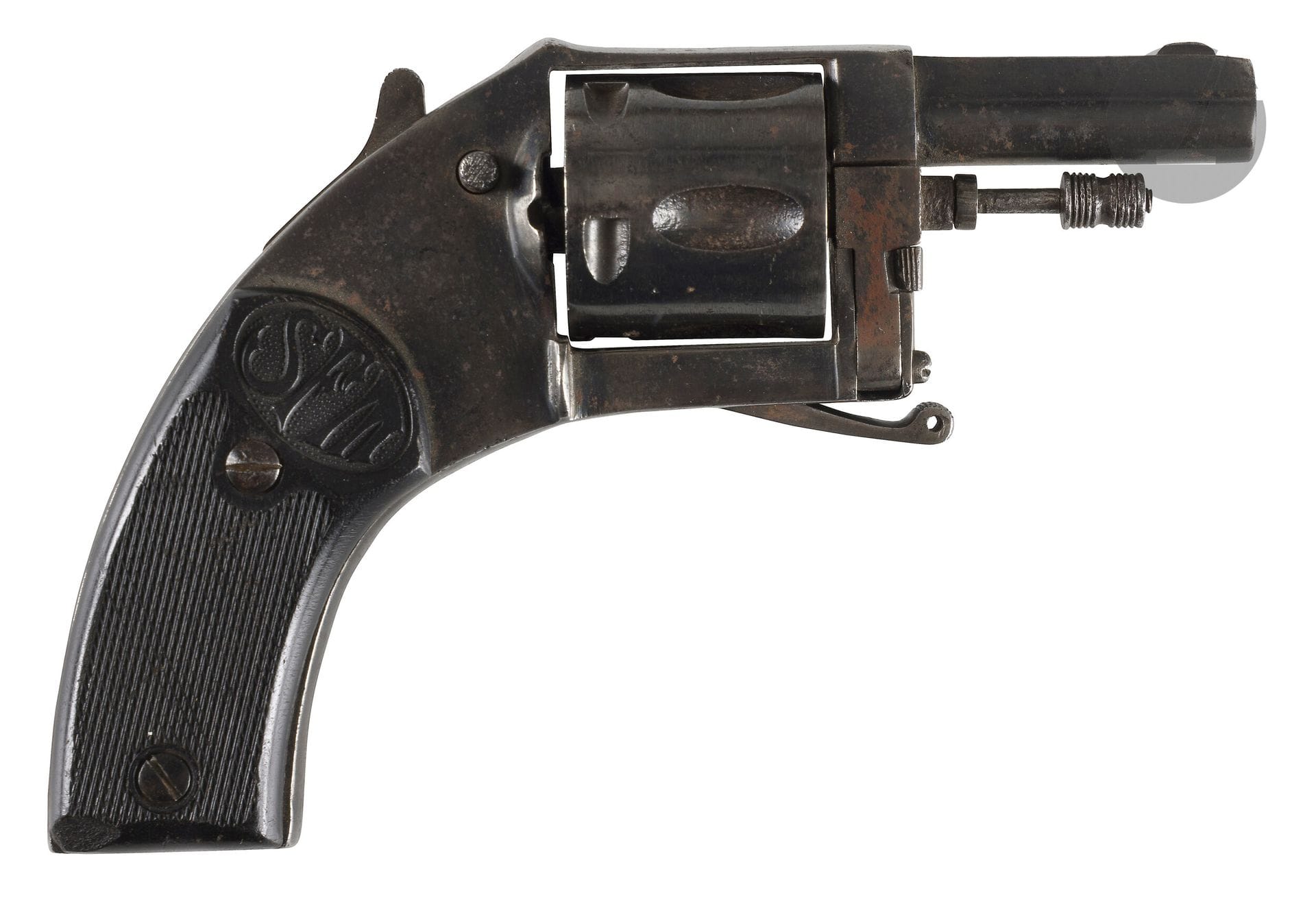 Bull Dog SFM five-shot revolver, 320 caliber. 
Round barrel. Hollow barrel. Folding trigger. Blued frame. Checkered wooden stock plates with initials.
B.E. Circa 1880-1900.