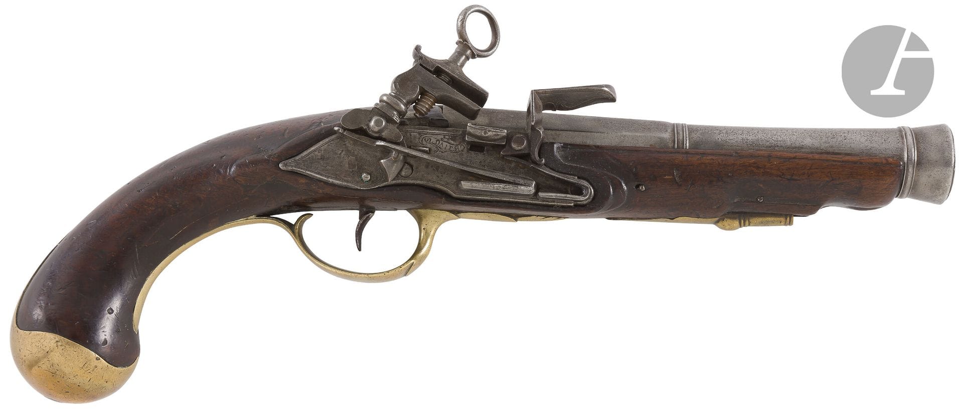 Italian officer's flintlock pistol. 
Round barrel, flared at the muzzle, with thunderbolt flanks, stamped "R.F. DI NAP". 
Miquelet-style flat-body lock signed "VI.DALESIO", hammer and battery decorated with line work. Plain brass trimmings (counterplate pierced with holes). Varnished walnut stock. Missing ramrod. 
Length : 31 cm 
A.B.E. circa 1760-1780.