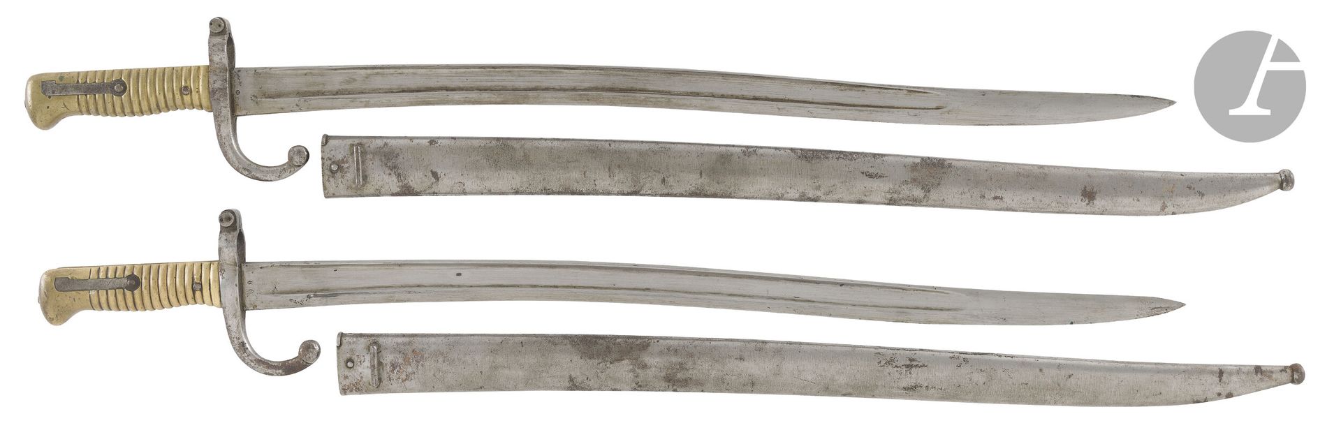 FRANCE 
Two Model 1866 bayonet sabers. 
- Blade marked "Mre Impale de Tulle Aout 1867". 
- Blade with remnants of markings "Mre Impale de Mutzig Mai 1867". 
Sheet metal scabbards. 
A.B.E.