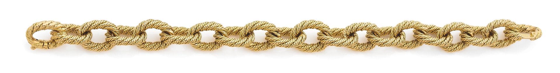 18K (750) gold bracelet, articulated with twisted oval links. French work. Traces of number. Length: 22cm approx. Weight: 73.6g
A gold bracelet