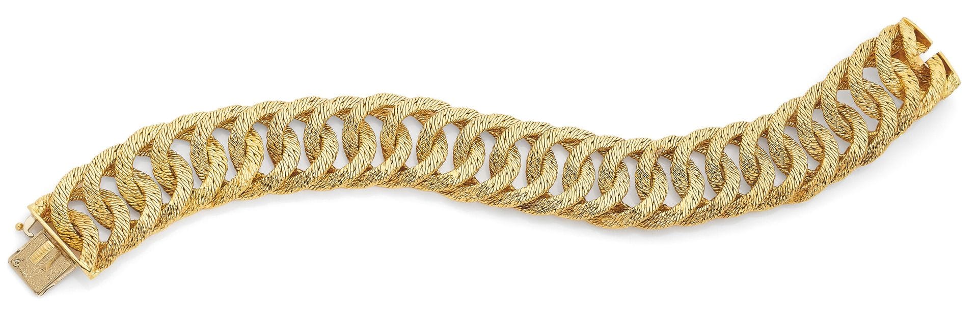 CARTIER par GEORGES LENFANT
Bracelet en or, articulé d’anneaux ronds enchevêtrés. Signé, poinçon de maître. Travail français. Dimensions: 20,5x2cm environ. Poids: 92,3g
A Cartier by Georges Lenfant bracelet