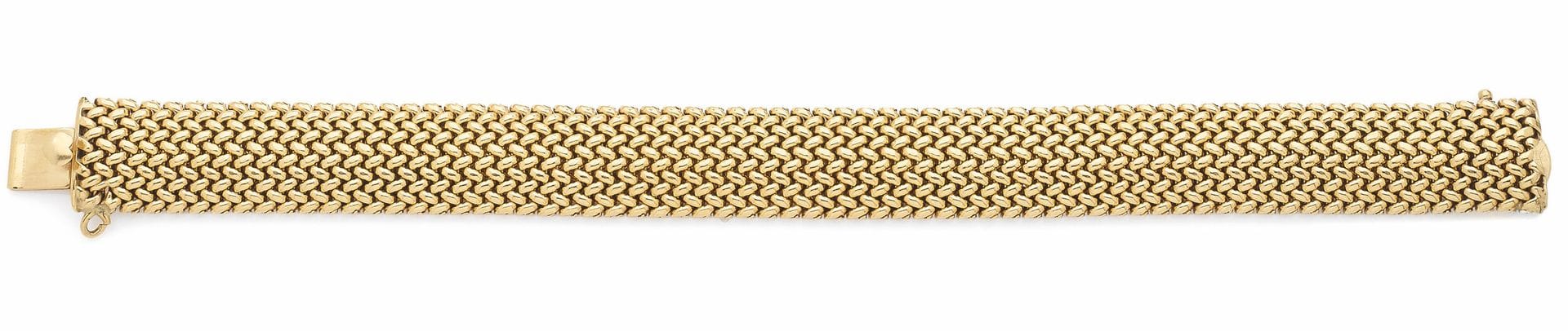 Ribbon bracelet in woven 14K (585) gold fabric. Dimensions: 1.5x19.5cm approx. Weight: 48g
A gold bracelet