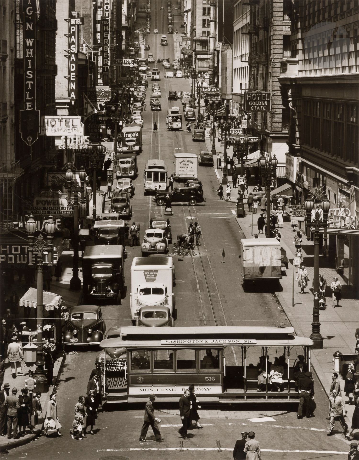 Max Yavno (1921-1985)
Powell Street. San Francisco, 1947. 
Silver print (c. 1975), mounted on card, signed and dedicated "for Lucien" in pencil on the lower mount. 
34 x 26.5 cm