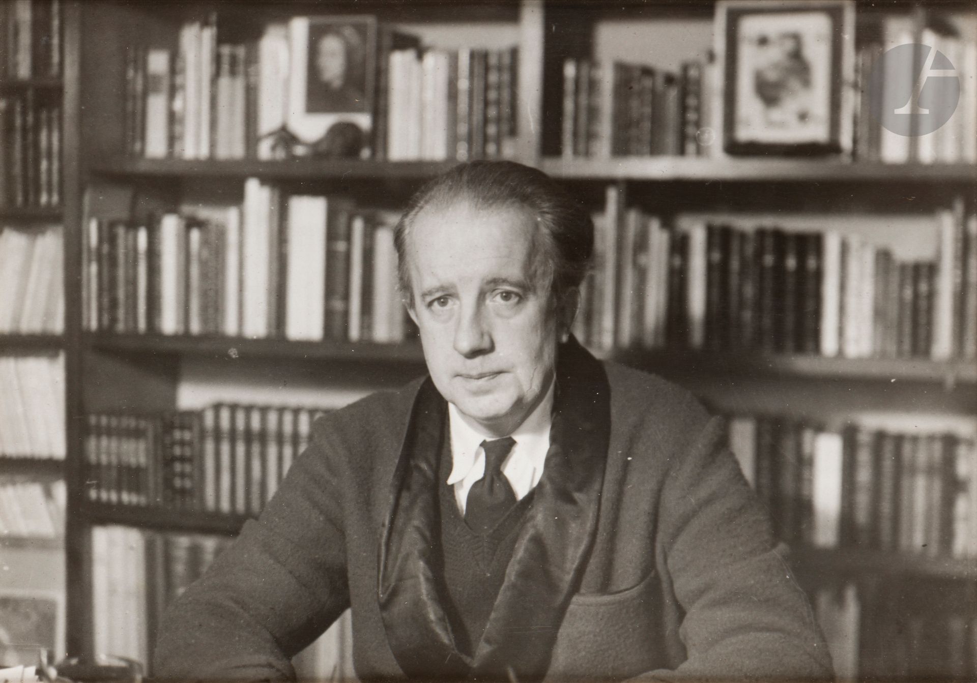 Henri Martinie (1881-1963) 
Paul Éluard at home, 1950. 
Vintage silver print, matted, dedicated in ink by Paul Éluard on the lower mount "Pour Max Ph. Delatte, cette triste figure. Paul Éluard". Annotations in pencil on verso.
13 x 18 cm