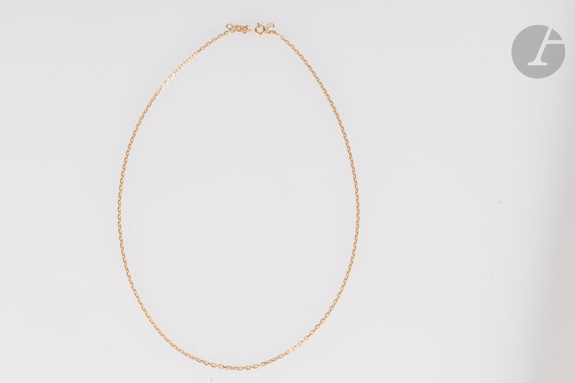 Chaîne en or jaune 18K (750). Longueur : 49 cm. Poids : 8,6 g