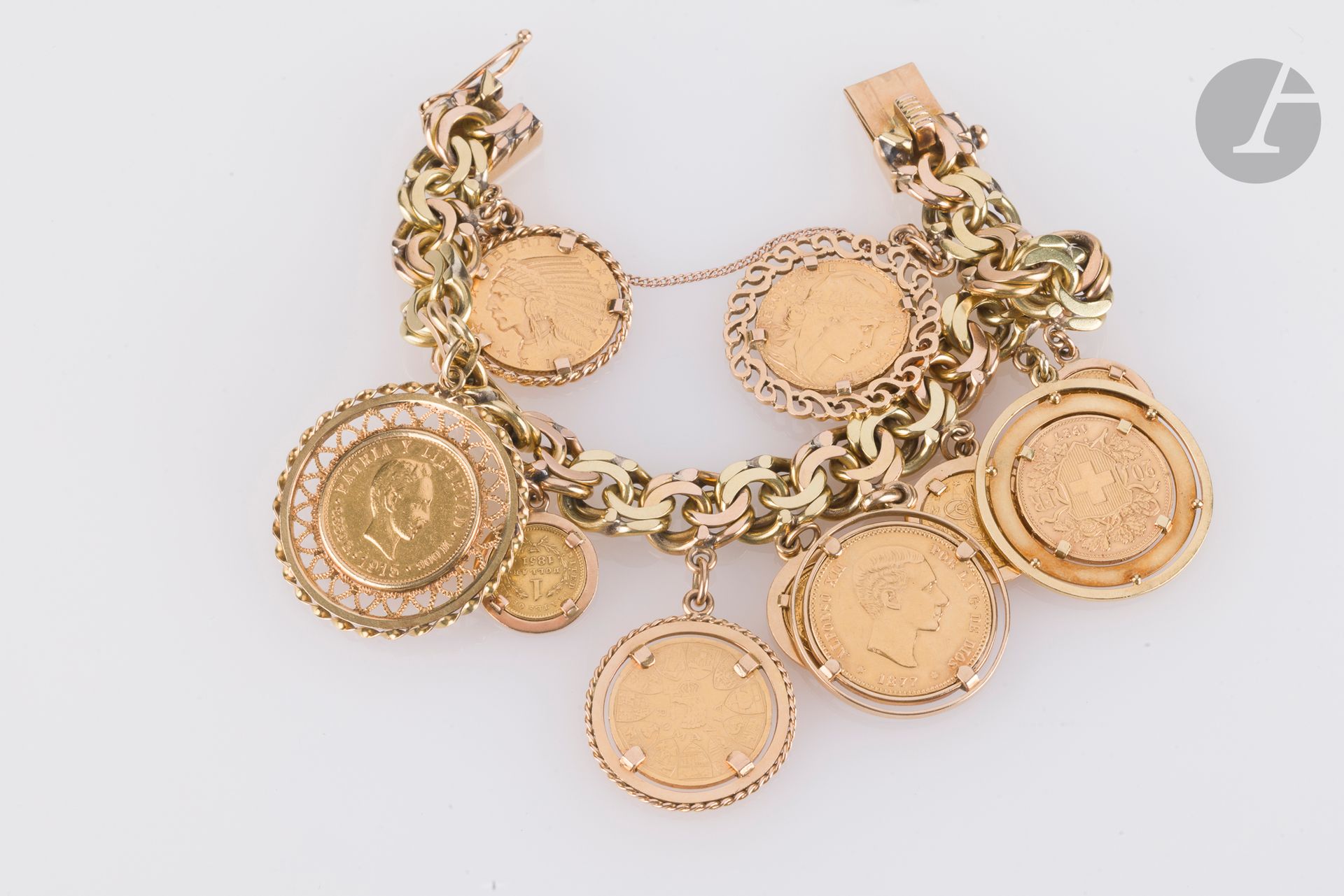 Two-tone 18K (750) gold bracelet holding 10 charms set with various coins. Length: approx. 18 cm. Weight: 154.2 g