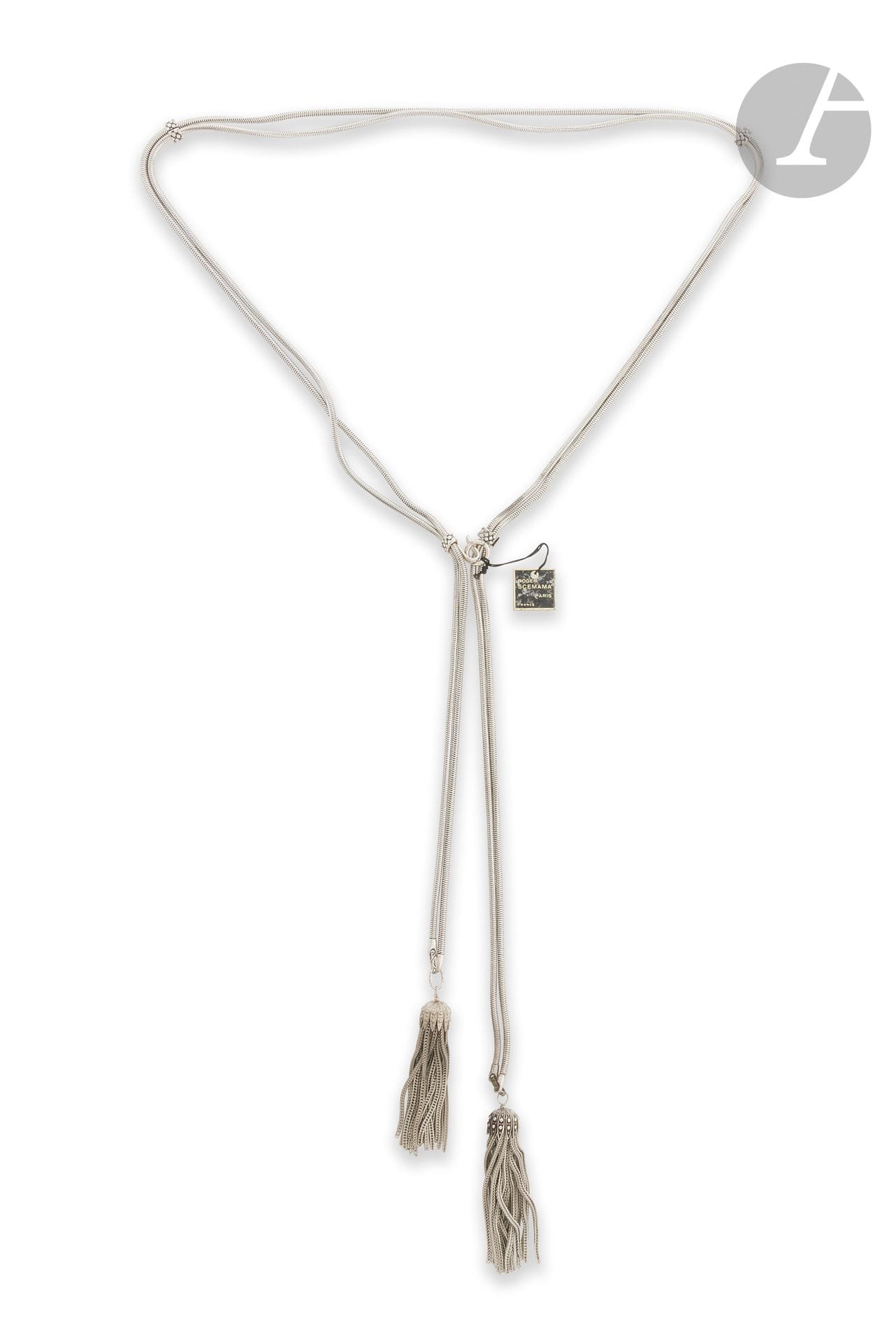 ROGER SCEMAMA
Tubogaz silver-plated belt or necklace with two tassels. Unsigned. L : 78 cm