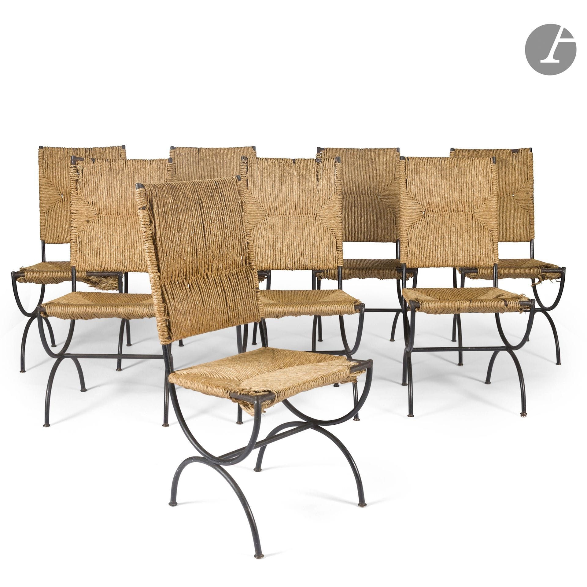 GALERIE MAISON ET JARDIN - GILLES SERMADIRAS DE POUZOLS DE LILE (1909-2007) FONDATEUR ET DIRECTEUR ARTISTIQUE
Suite de 8 chaises en métal tubulaire laqué noir. Les pieds latéraux en double arceaux. Les assises et les dossiers paillés d'origine. Années 1950-1960. Accidents et manques aux paillages. H. 90 cm - L. 45 cm - P. 45 cm 

Provenance : 
D'un importante décoration de la Galerie Maison et Jardin restée jusqu'à aujourd'hui dans la même famille.