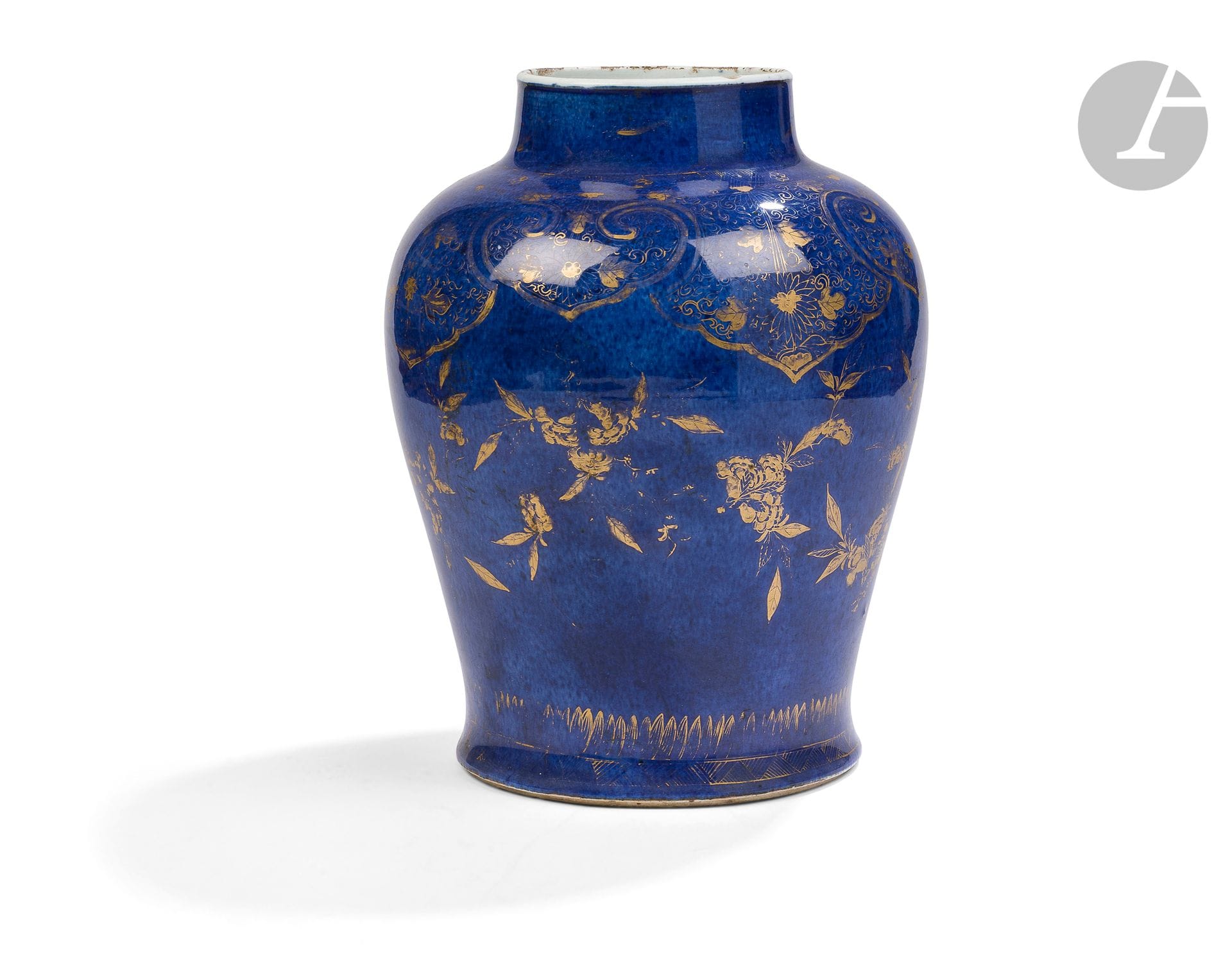 Powder-blue porcelain vase, China, 18th century 
Baluster-shaped, the body and neck are decorated in gold over glaze with flowering branches. The shoulder is decorated with chrysanthemum flowers, leaves and foliage in large cartouches in the form of lingzhi heads. A frieze of banana leaves and a stylized band surround the foot. The underside is glazed with a double circle in underglaze blue. 
Height: 33 cm 
Chips at the edge of the neck and significant lack of gilding.