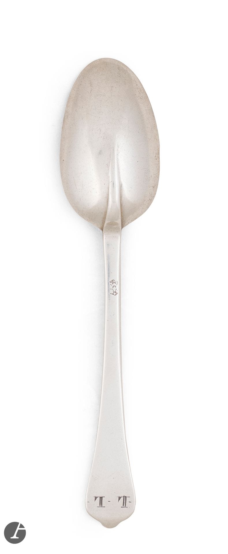 PARIS end of the XVIIth early XVIIIth century
Silver soup spoon rat tail model. Engraved on the end of the spatula L.L.
Master silversmith : Michel GODIN (or GAUDIN) his new hallmark after 1680
Weight: 55 g - length: 19.5 cm
Marked: only the master goldsmith's mark is shown.
