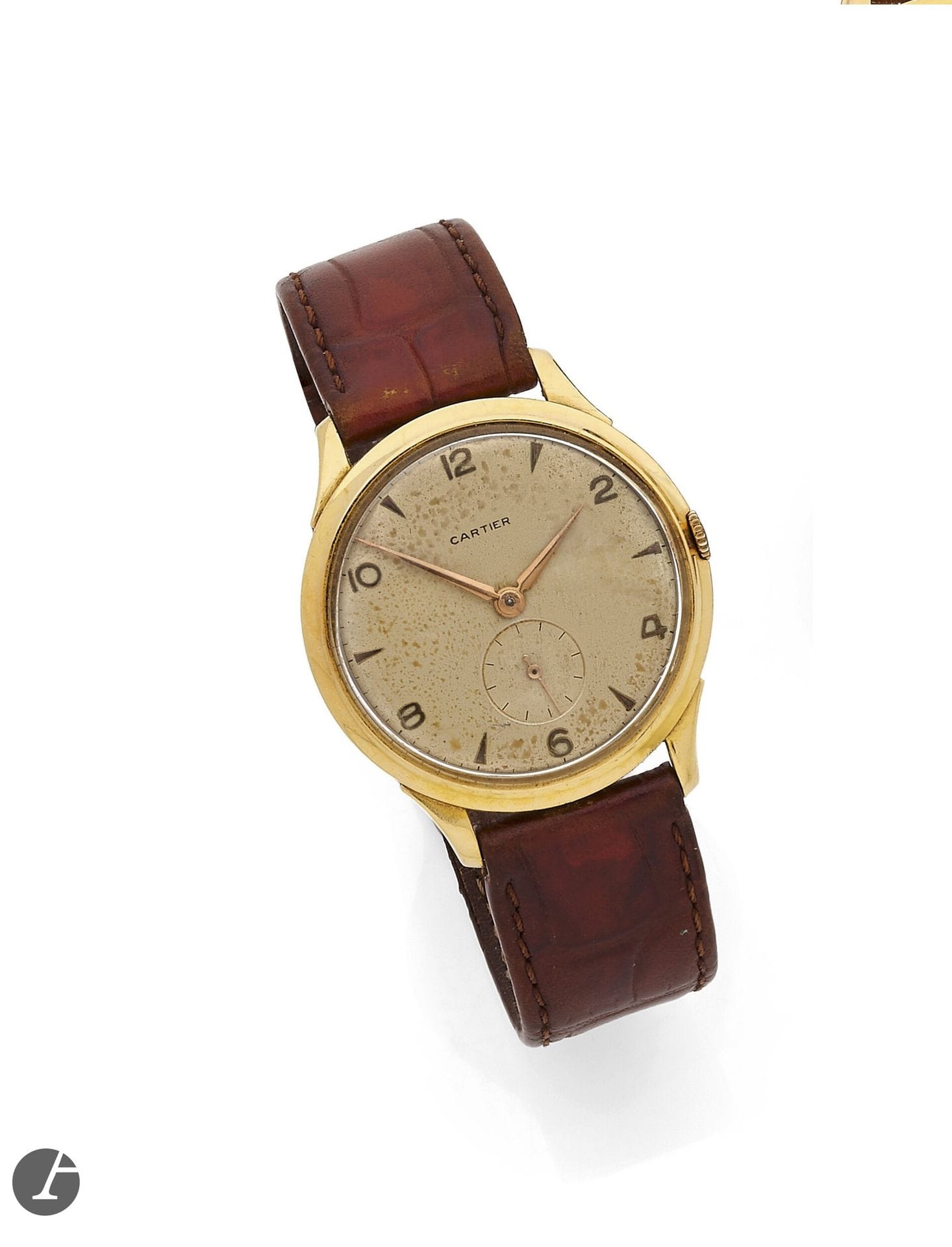 CARTIER  
50'S 
Wristwatch in 18K (750) yellow gold on leather. 
Case: round, pressure caseback, eagle head hallmarks, E.J. master hallmark. Crown integrated into case. 
Dial: silvered, applied Arabic numerals and herringbone hour markers, leaf hands, small seconds at 6 o'clock, signed Cartier. 
Movement: mechanical, signed European Watch, N° 822'749. 
Strap: leather with attached buckle. Numbered 126'888. Diam. 34 mm Gross weight: 36.6 g