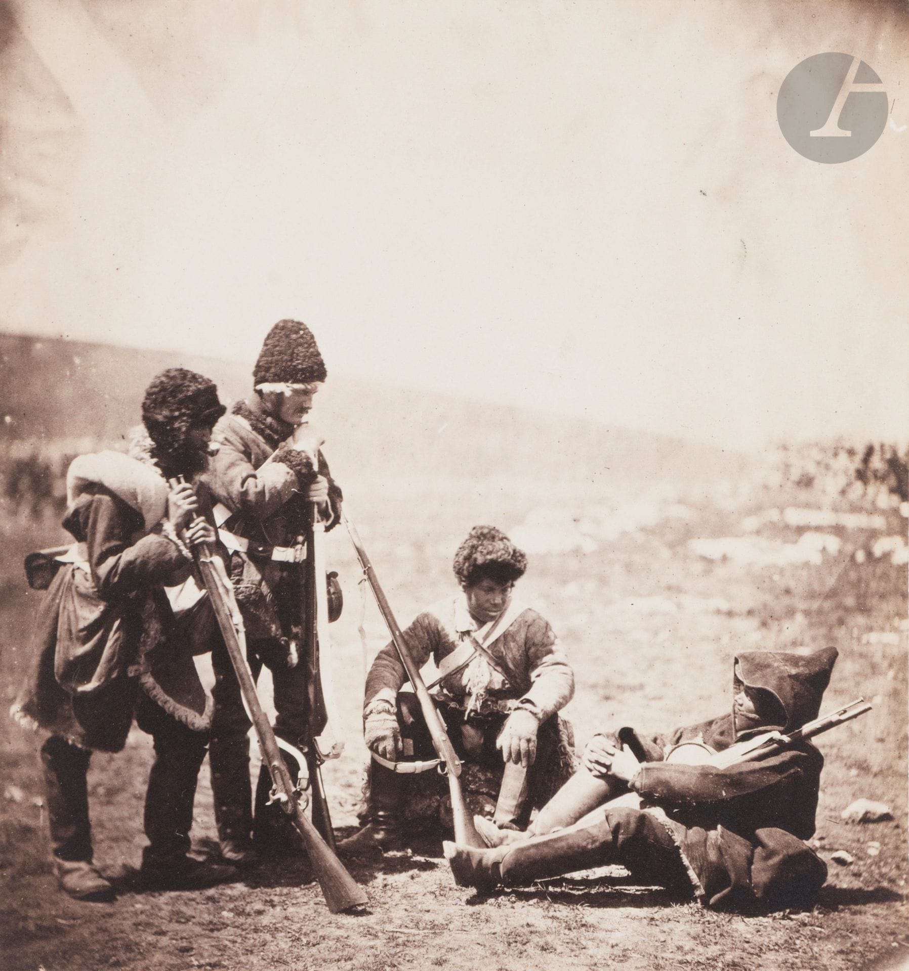 Roger Fenton (1819-1869)
Crimean War, 1855- 1856.
Men of the 77th ready for the trenches. 
Salt paper print from a collodion glass negative, mounted on publisher's card (T. Agnew &amp; Sons). Photographer's credit, caption and date printed on mount at bottom. Annotations on verso of mount. 
17 x 15.8 cm