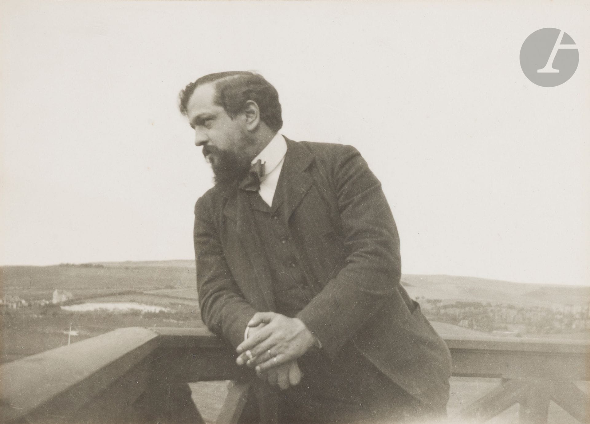 Emma Bardac (1862-1934)
Claude Debussy on the balcony. Pourville, 1904. 
Vintage silver print, mounted on card.
13 x 18 cm