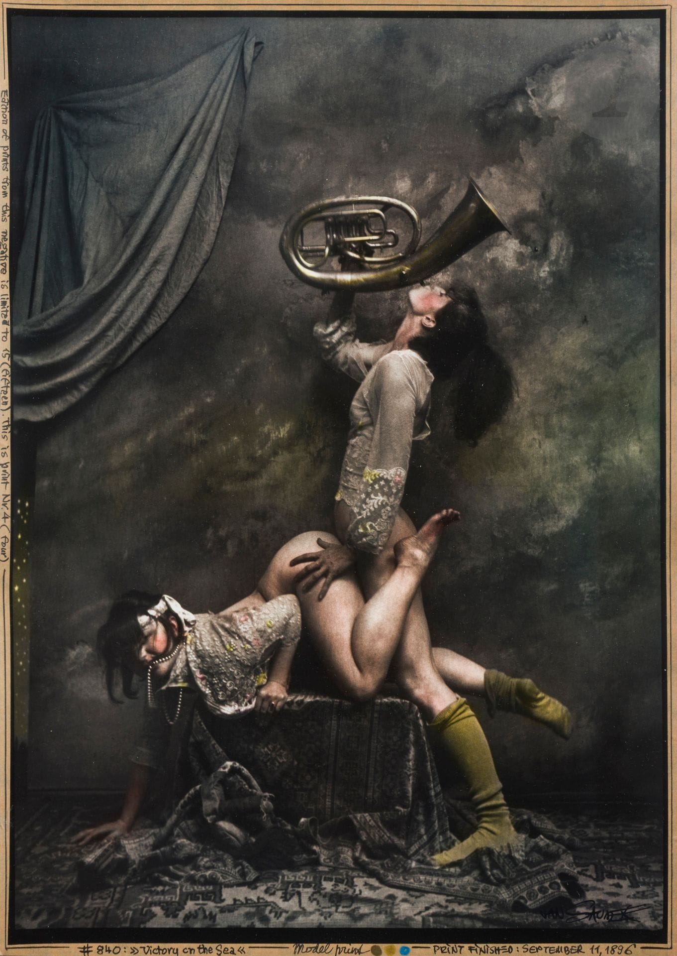 Jan Saudek (1935)
Victory on the Sea, 1986.
Épreuve argentique d’époque, rehaussée de couleurs, signée à l’encre en bas à droite, titrée, datée, annotée « model print » et numérotée à 15 exemplaires à l’encre sur la bande en papier kraft. 
41 x 30,5 cm - cadre