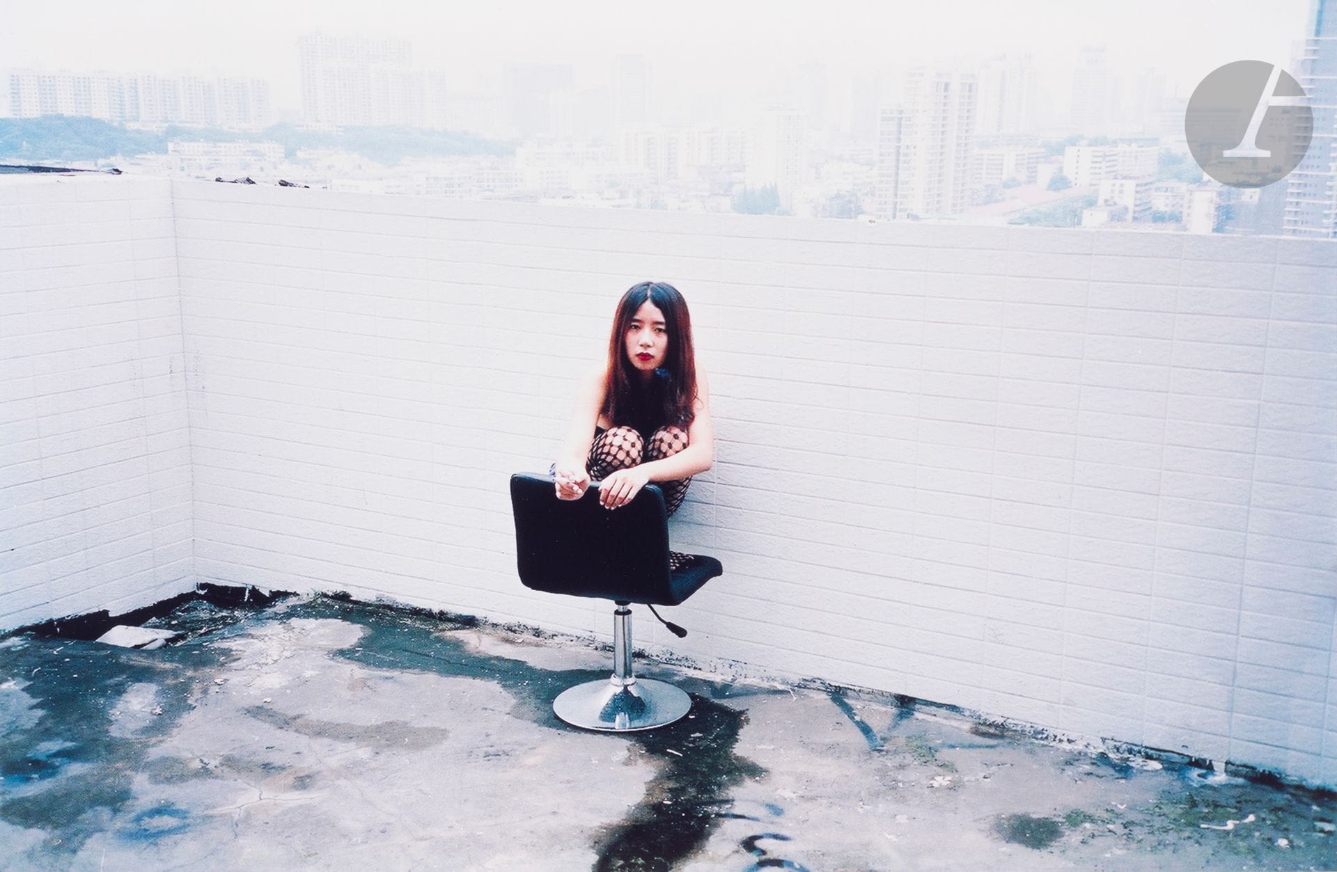 Ren Hang (1987-2017)
Untitled [Woman with chair], 2010. 
Vintage chromogenic print on Kodak paper, signed, dated and numbered 10 copies in ink on verso. 
26 x 40 cm