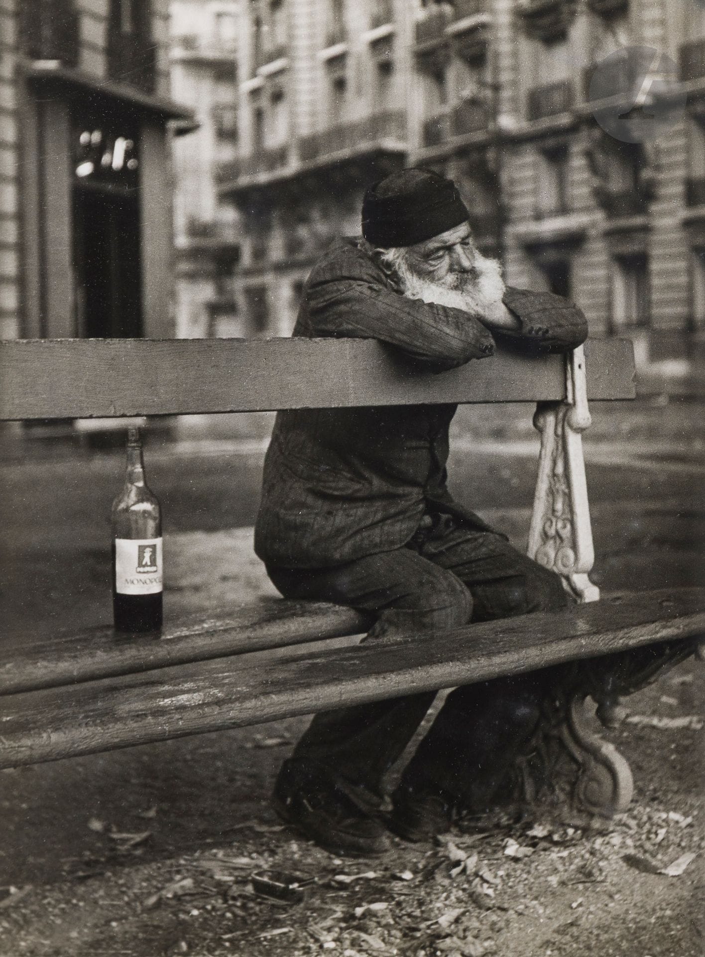 Sabine Weiss (1924-2021)
Untitled [man at bench]. Paris, 1951. 
Vintage silver print, signed, located and dated with the stamp "Photo Sabine Weiss" on verso. 
39.8 x 29.8 cm - framed