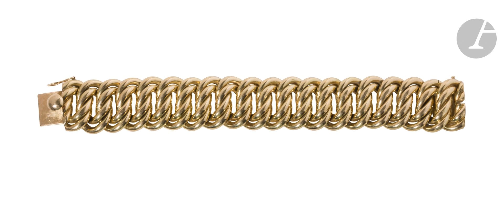 Bracelet gourmette en or 18K (750) en or tressé. Longueur : 18,3 cm. Poids : 94,9 g