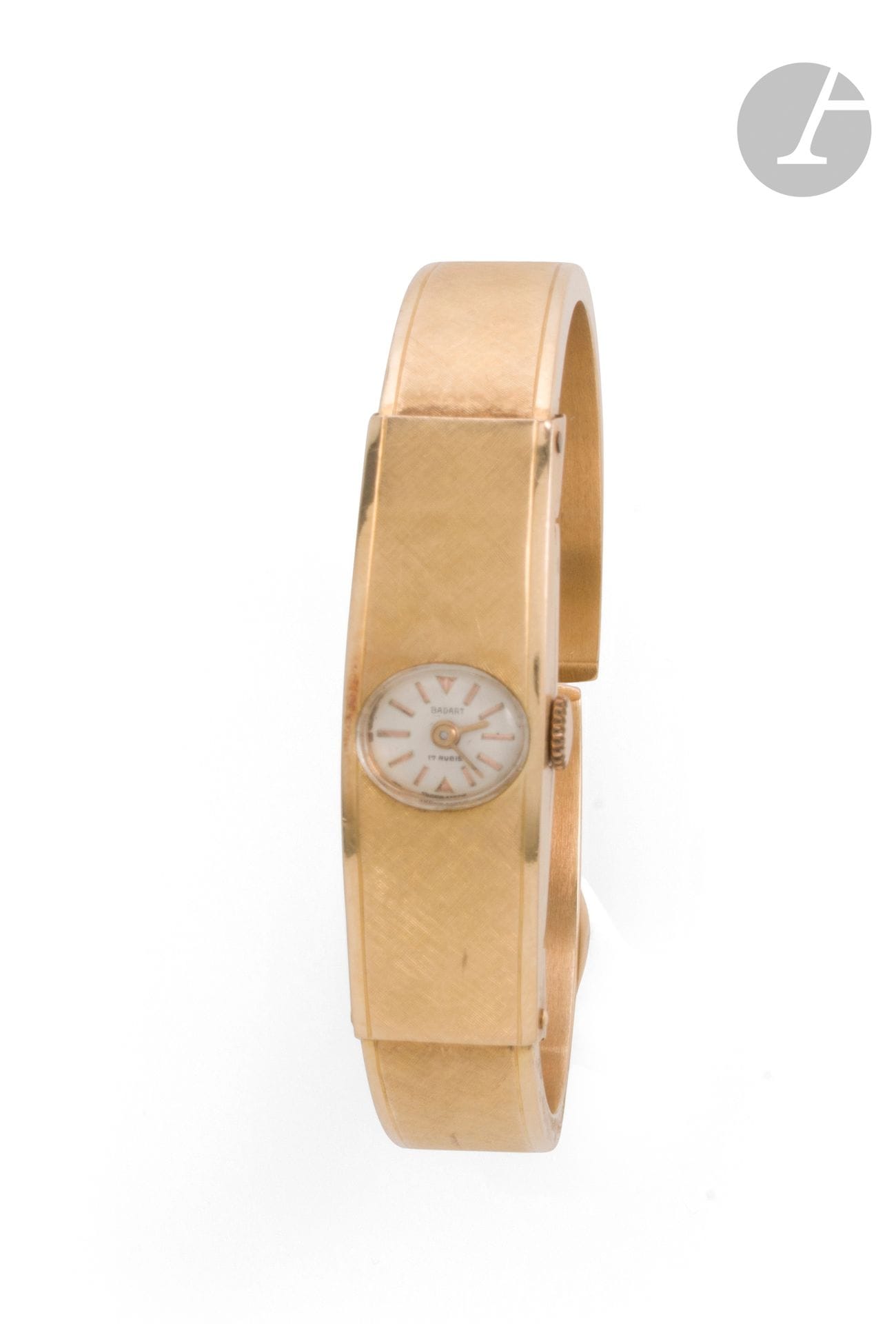 Montre de dame en or 18K (750). Poids brut : 16,7 g   (enfoncements, fonctionnement non garanti)