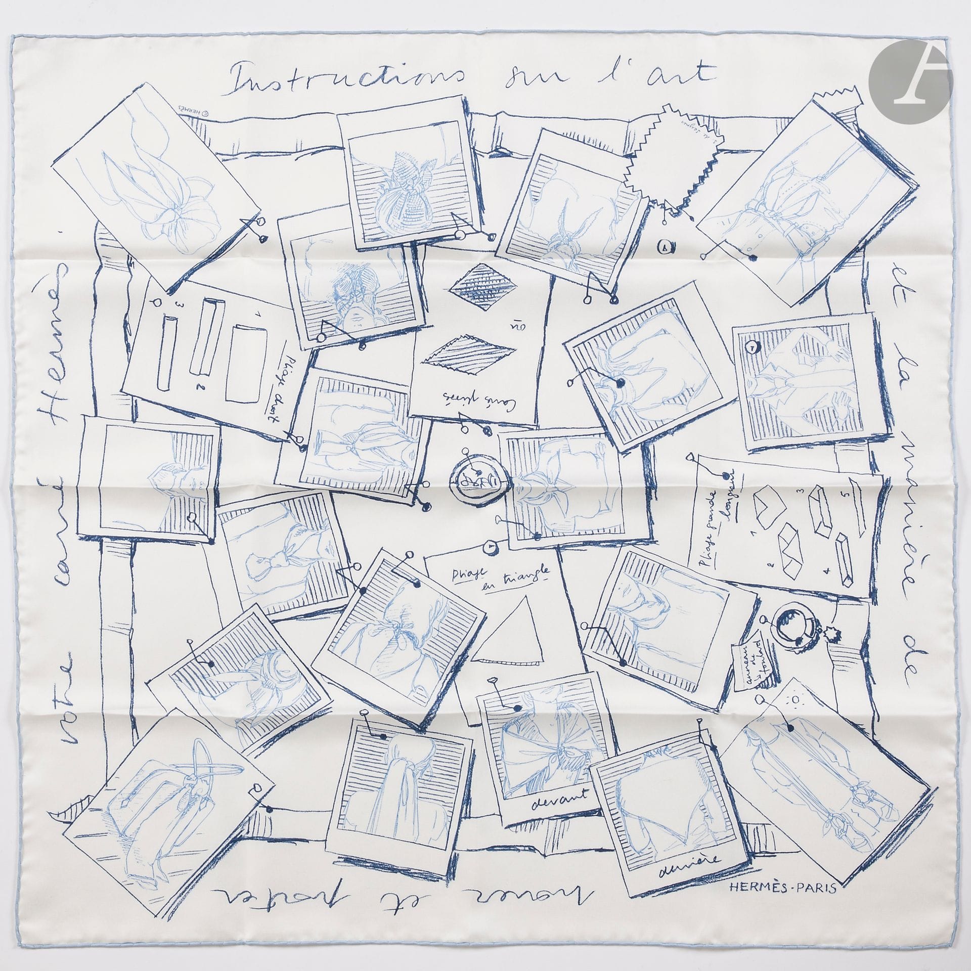 HERMÈS PARIS
Carré 65 en twill de soie "L'Art de nouer son carré", fond blanc, dessins et roulotté bleus. 67 x 67 cm. Dans sa boîte
