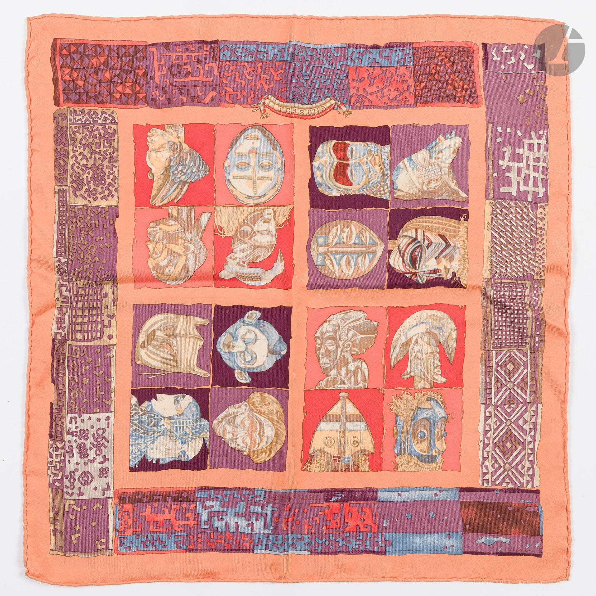 HERMÈS PARIS
Carré 90 in "Persona" silk twill, signed Loïc Dubigeon, orange background (some threads pulled)