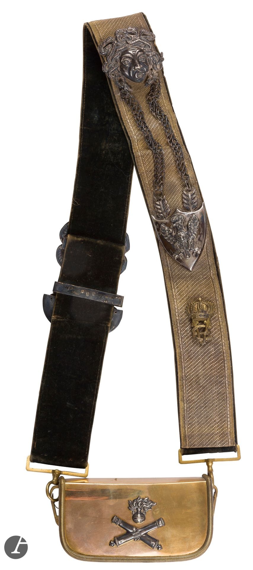 Italian artillery officer's gigerne.
Velvet-covered, black morocco case. Gilded brass case and sides. Crossed barrel and grenade motifs in silver-plated metal. Velvet band covered with gold braid. Silver eagle, mask and trim motifs. Figured "EV" under bronze crown. 
B.E. (wear and tear).