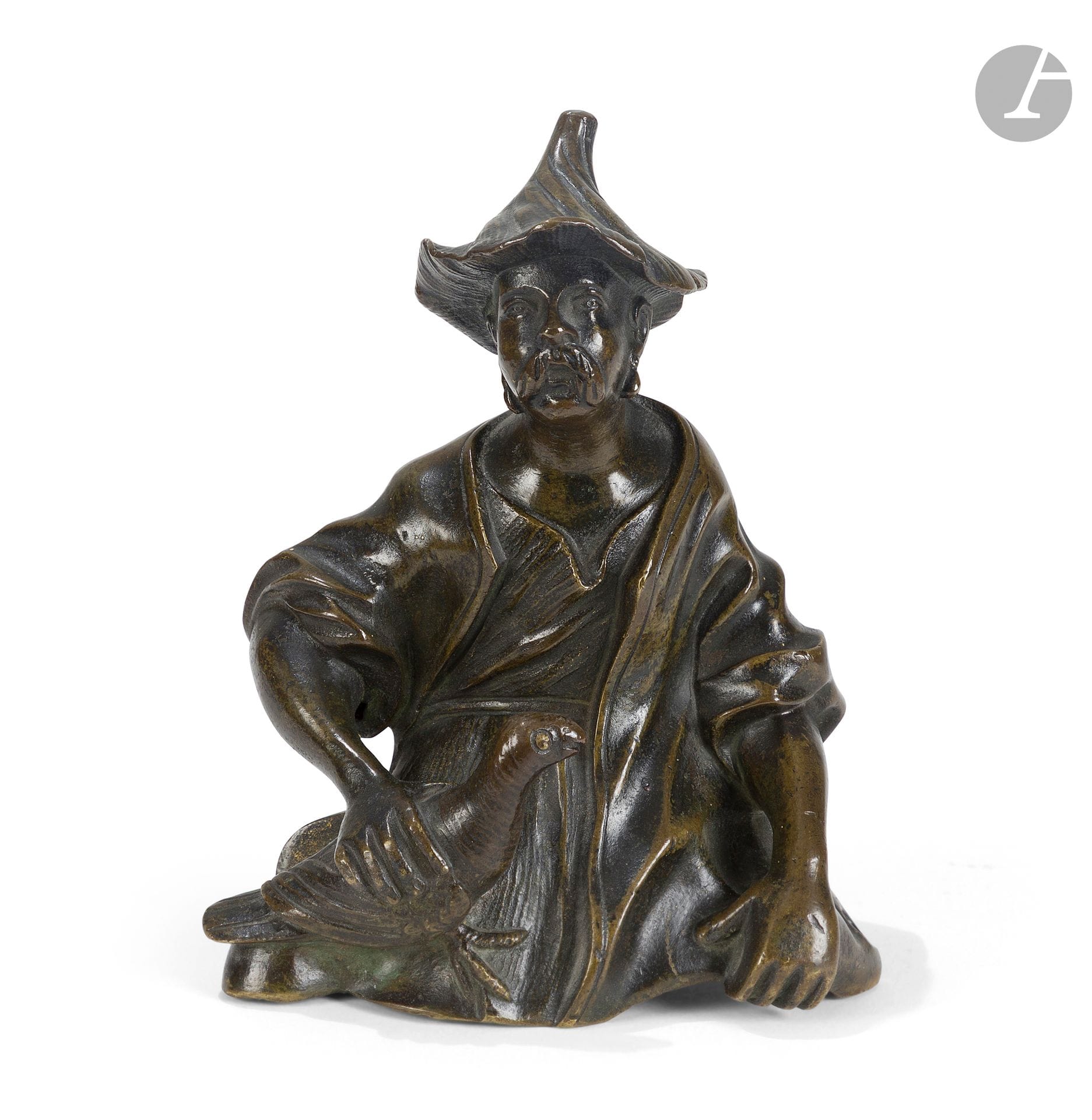 19th century French school
Asian man holding a bird 
Decorative element in bronze with brown patina
H. 14.5 cm