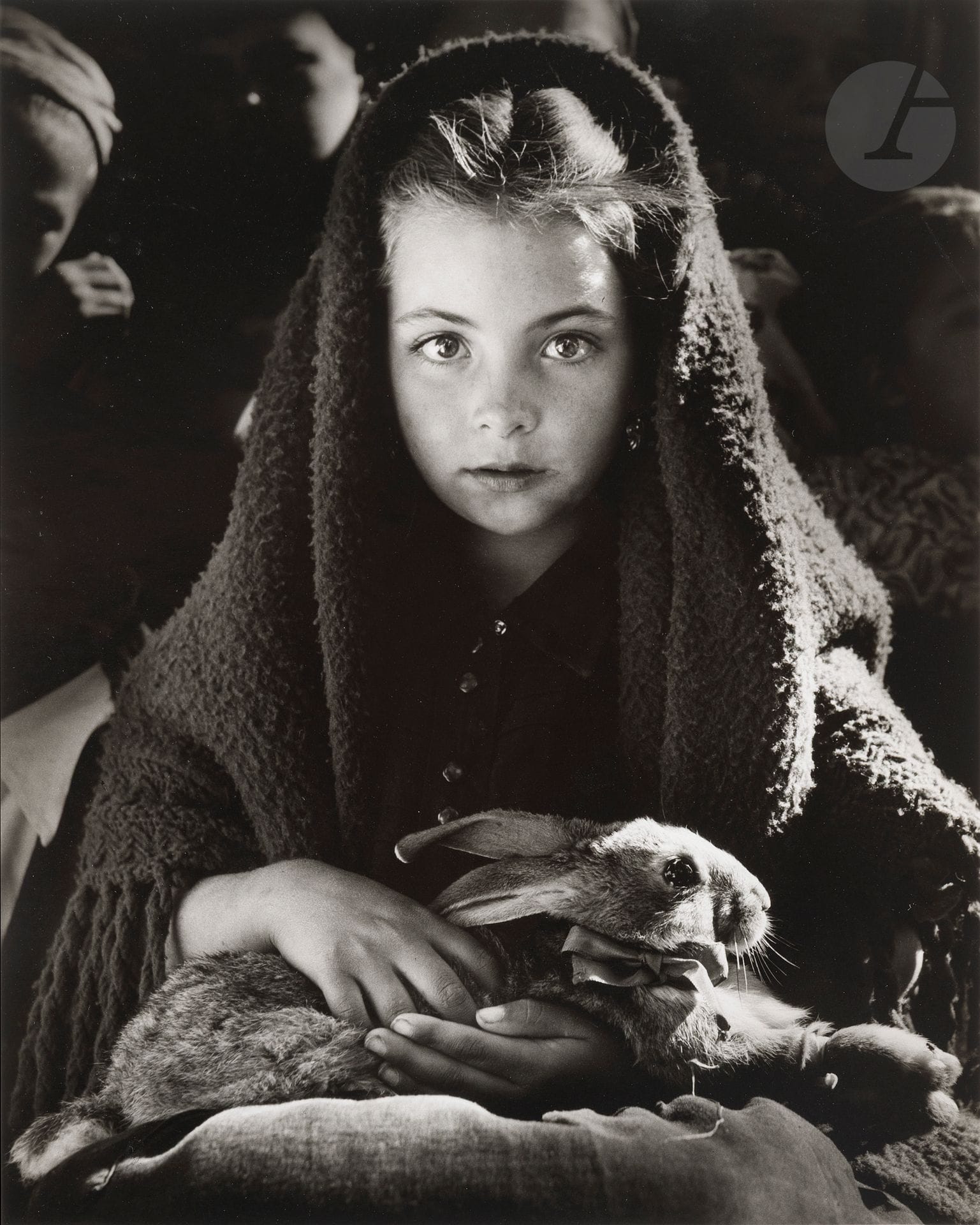 Jean Dieuzaide (1921-2003)
The little girl with the rabbit. Nazaré, Portugal, 1954. 
Silver print (printed under the supervision of Michel Dieuzaide in 2001). Stamp "Photographie réalisée par Jean Dieuzaide", title and dates in pencil on verso. 
Image: 44 x 35.5 cm - Sheet: 50.5 x 40.5 cm