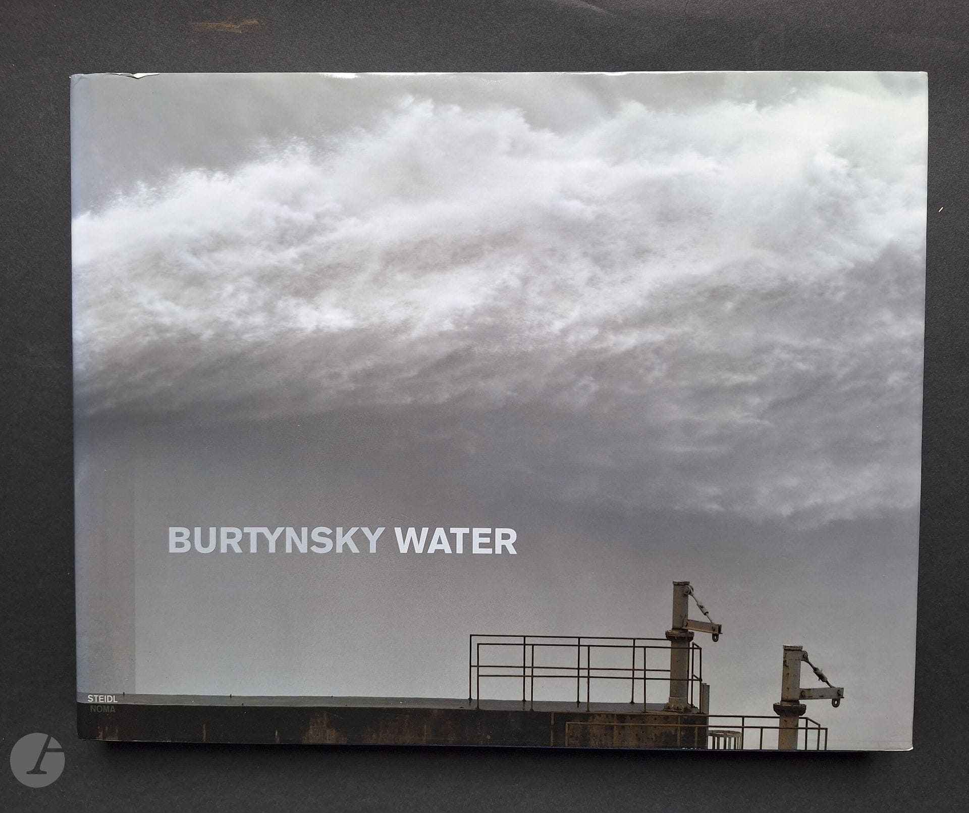 2013 BURTYNSKY, EDWARD (1955)
Water.
Steidl/Noma, 2013.
Large folio (29 x 37 cm). First edition. 228 pages. Texts by Wade Davis and Russell Lord. Bound in blue cloth titled in white in illustrated dust jacket.