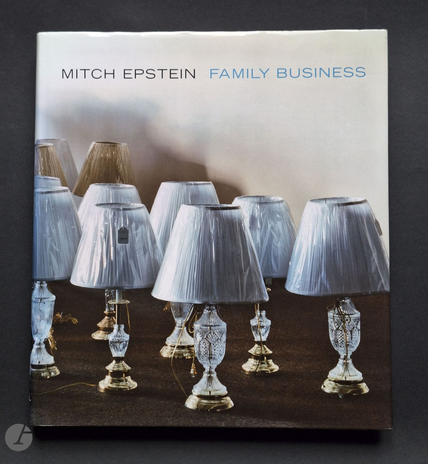 2003 EPSTEIN, MITCH (1952)
Family Business.
Steidl, 2003.
Large in-4 (30.5 x 27.5 cm). First edition. 296 pages. Color photographs by Mitch Epstein, presented in 4 sections "Store", "Property", "Town" and "Home". Brown binding with white titling on spine, in illustrated dust jacket. Very good condition.