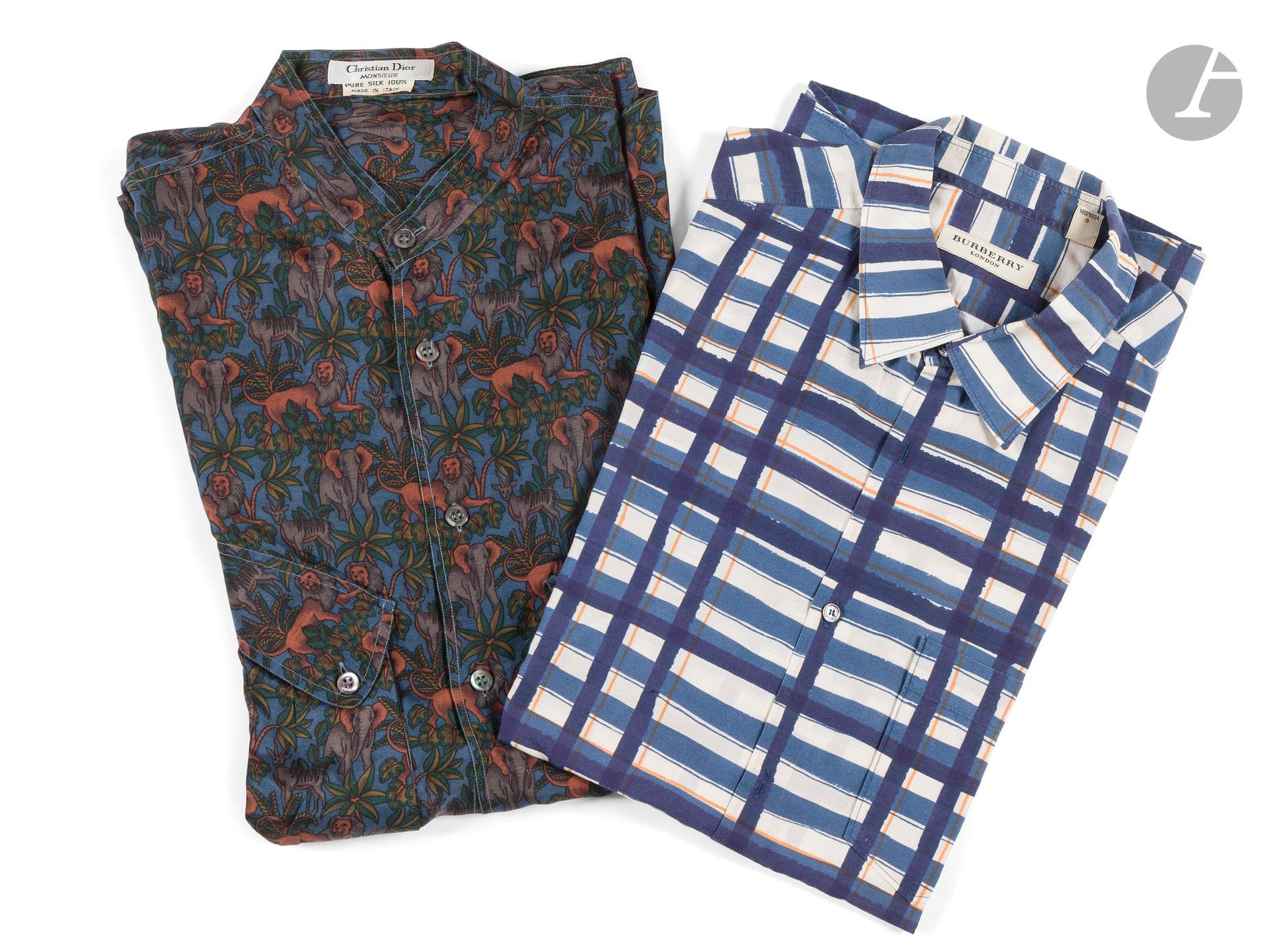 CHRISTIAN DIOR Monsieur and BURBERRY
Two men's shirts: one in silk decorated with savannah animals, the other in white and blue cotton. Approx. size L