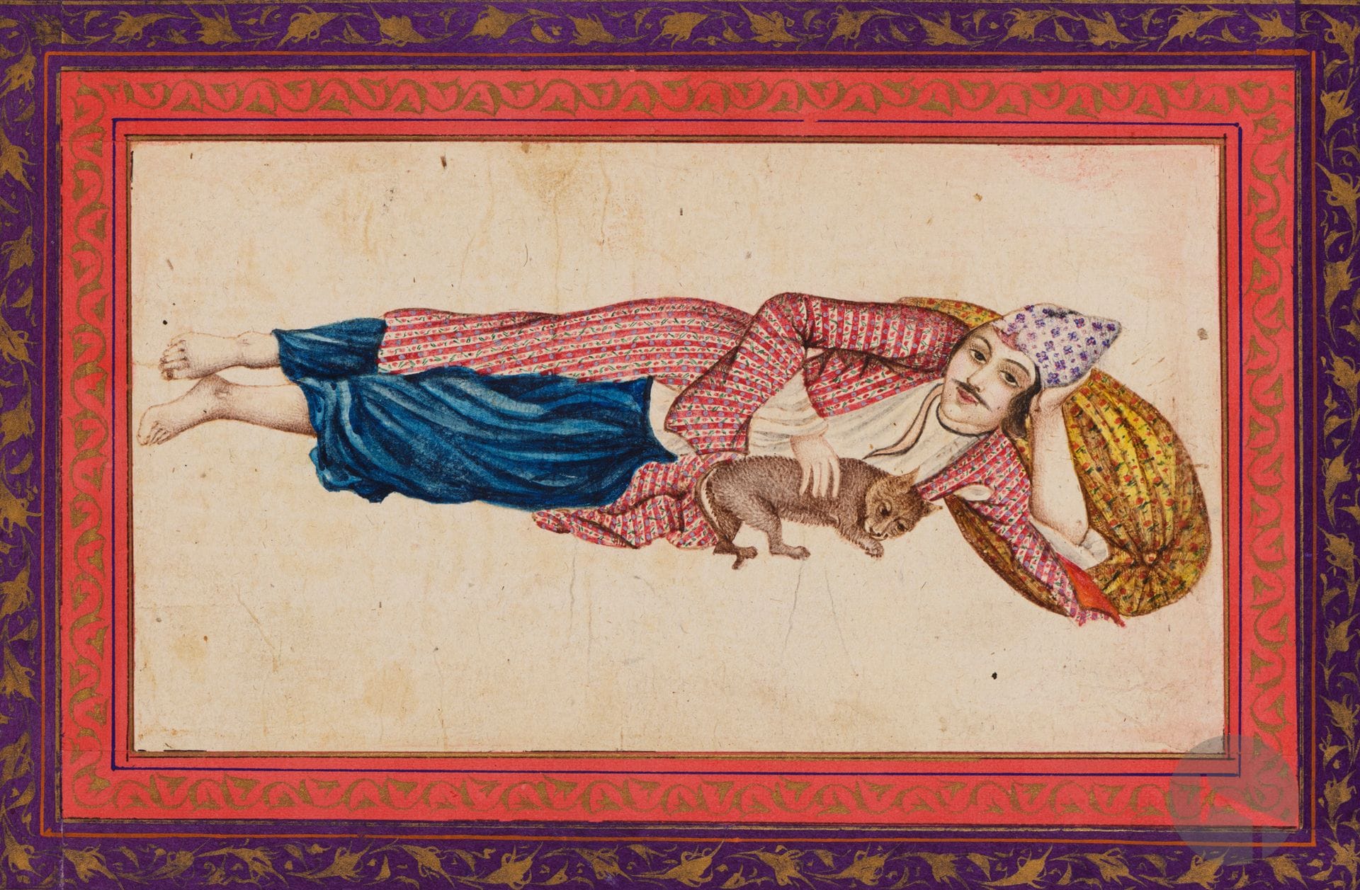 Reclining man with cat, Iran qâjâr, 19th century
Gouache and gold on paper depicting a moustachioed man reclining on his left side, his back resting on an imposing cushion, his head resting in his left hand. Dressed in puffy blue pants, a coat embroidered or printed with floral stripes and a triangular headdress, he is stroking a cat with his right hand. Mounted on a muraqqa album page on pink cardstock with floral and gilded borders.
Painting size: 8.5 x 15.2 cm; page size: 24 x 34 cm
Small folds and light stains.