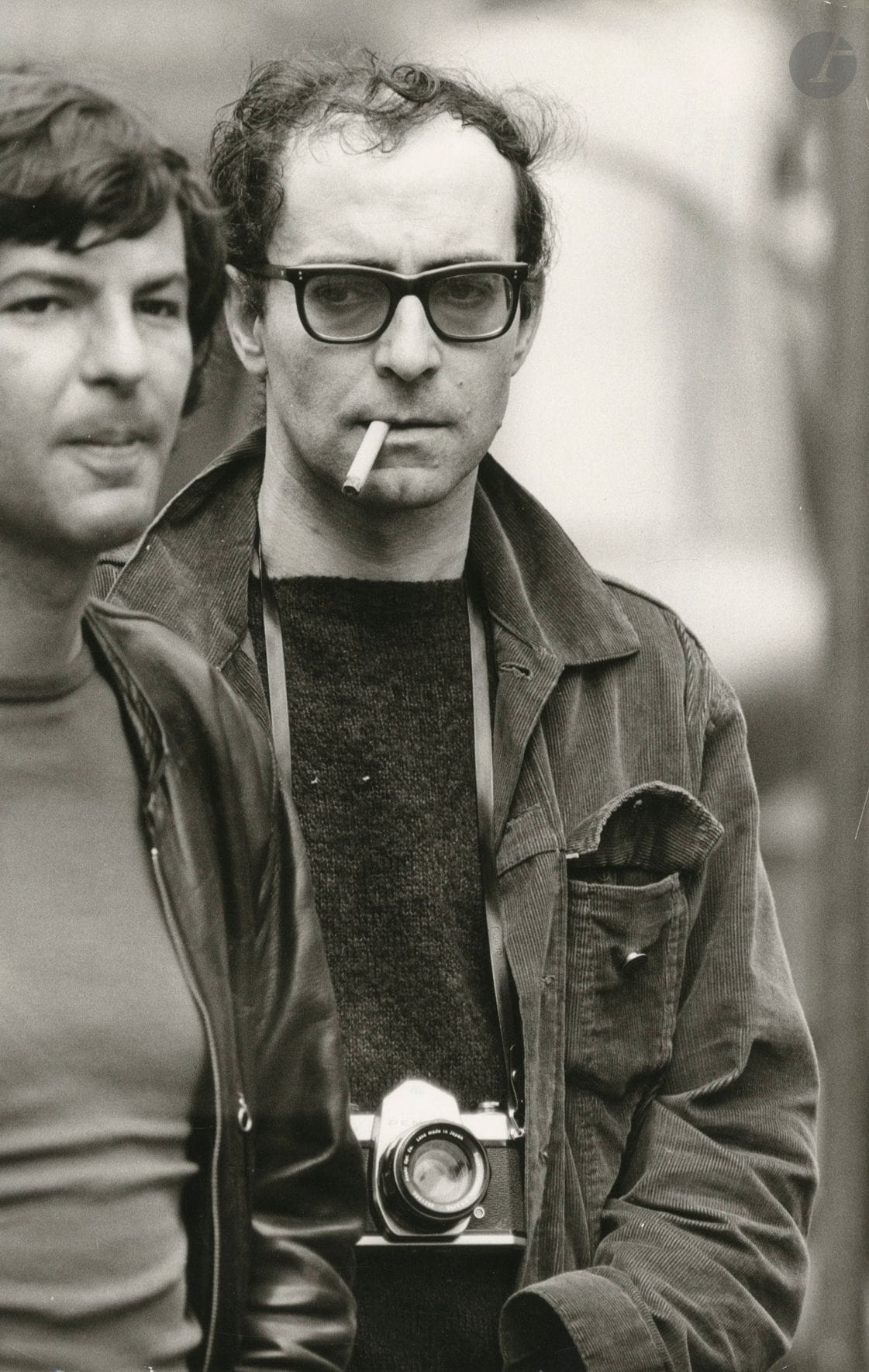 Henri Bureau (1940-2014) 
Jean-Luc Godard, mai 1971. 
Épreuve argentique d'époque. Tampon du photographe, tampon de presse, date et annotations au verso. 
30,5 x 20 cm