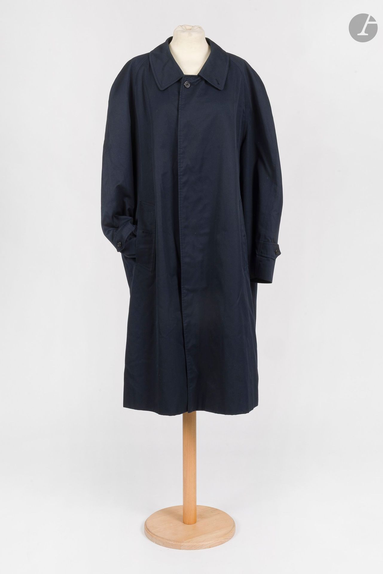 BURBERRYS'
Men's raincoat in navy gabardine. S.52 shown (some soiling)