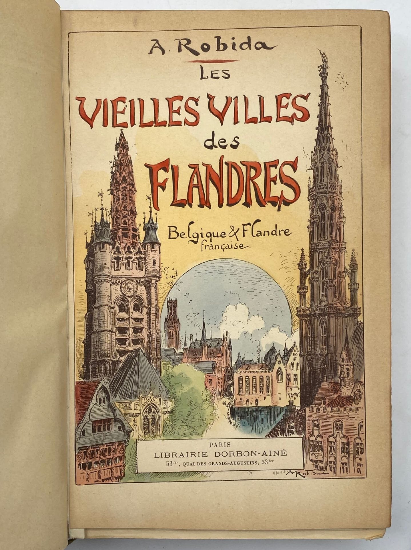 ROBIDA, Albert. The old towns of Flanders. Belgium &amp; French Flanders.
Published in Paris by Dorbon-ainé, s.d. (1908).
In-4, half plum chagrin with corners, ribbed spine, red morocco title page, gilt headband. Covers and spine preserved.
286 pp. with 155 original compositions, including 28 hors texte and one etching.
Spine unstained, a few scratches, spine ends rubbed. The binding replaces the original historiated publisher's sleeve.

Deluxe edition of this first edition, richly illustrated by the author.

Robida depicts several Flemish towns and offers a panorama of the region's most emblematic and picturesque monuments. Known for his anticipation and science-fiction novels, in which he describes in detail devices such as televisions, video projectors and videoconferencing, Robida is also renowned for his illustrated monographs on various European countries.
Limited edition of 126 copies, this one of 25 on Japon containing three states of the frontispiece and one state of the 155 illustrations on Japon avant la lettre.

Chenu-Tournier" bookplate on the flyleaf.
A very fine, well-established copy.
